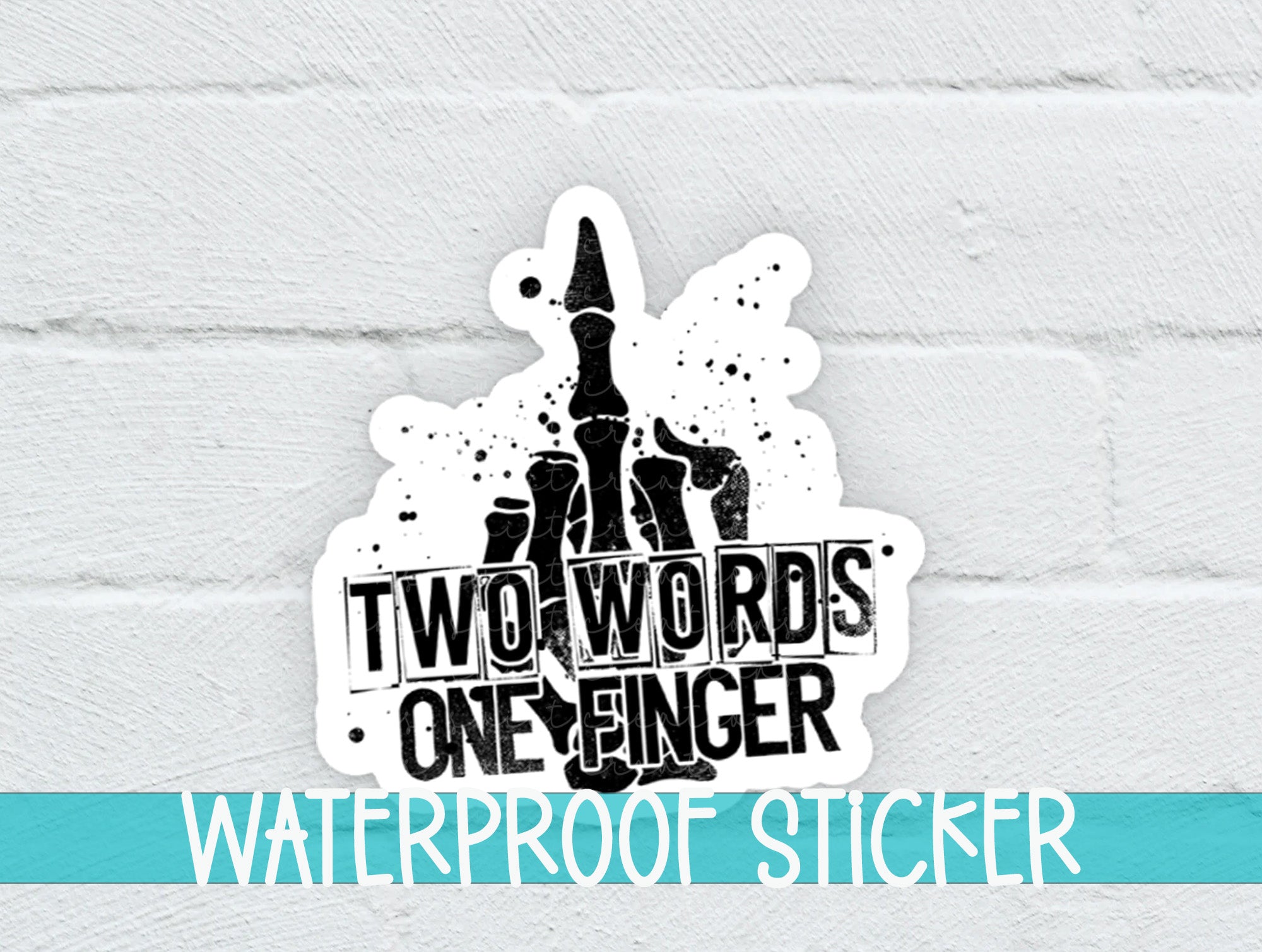 a white brick wall with a sticker on it