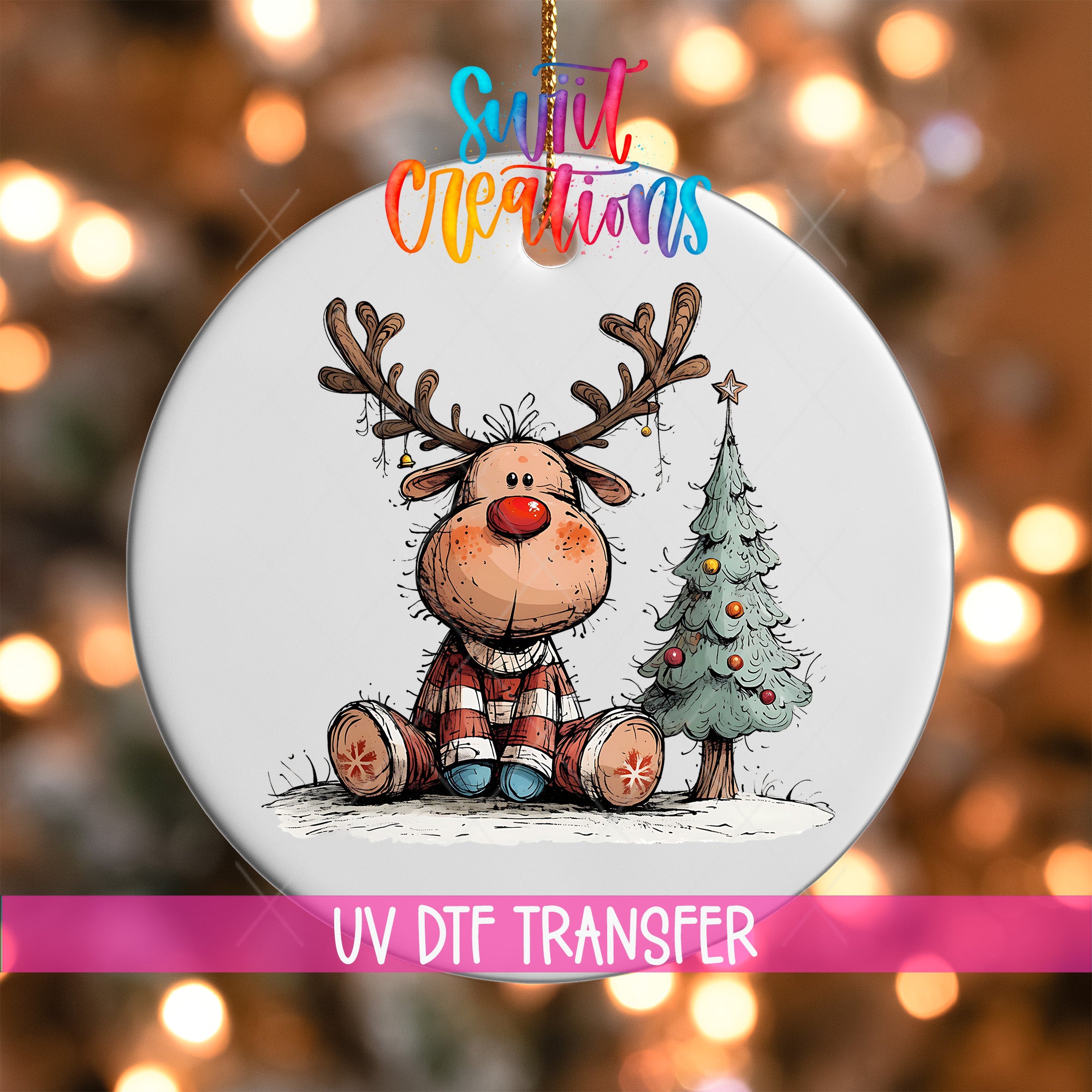 A white ornament with a cartoon reindeer and a Christmas tree, with the text "UV Dtf Transfer" below it.