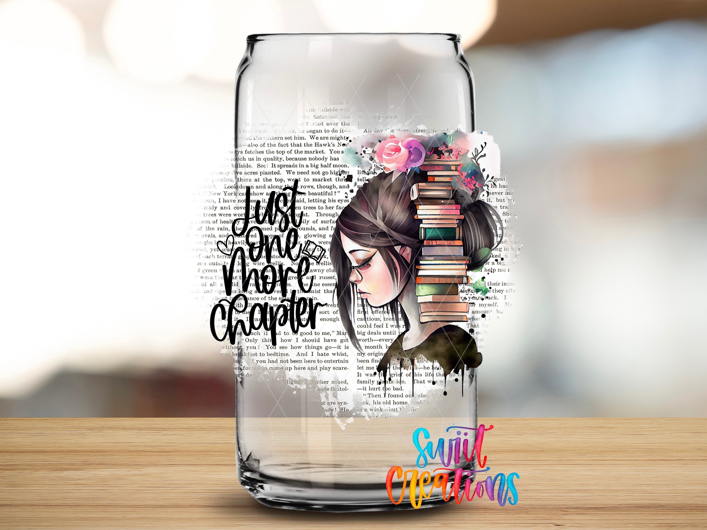 A glass can with a printed design featuring a woman's face surrounded by books and flowers.