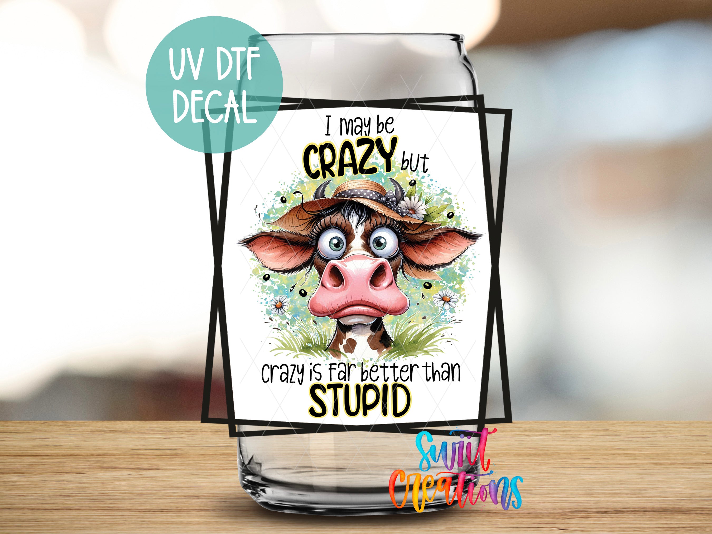 a glass with a picture of a cow on it