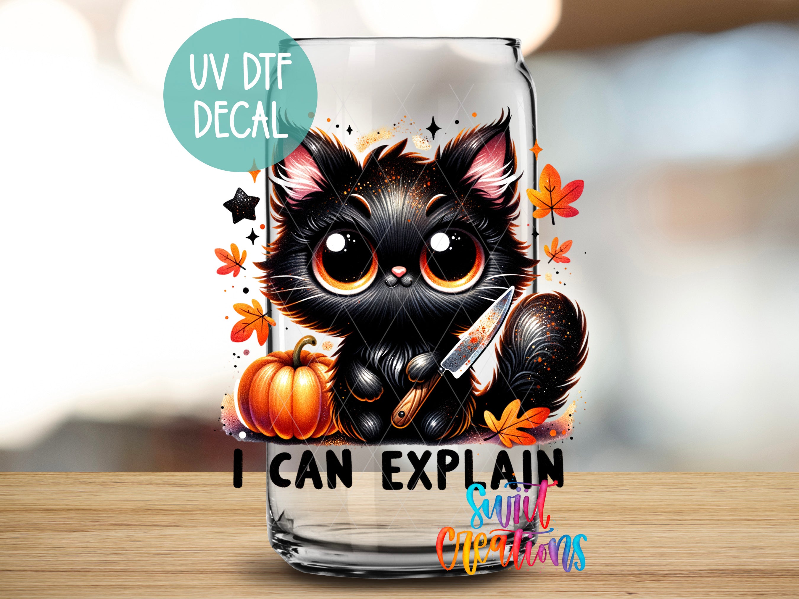 a glass with a picture of a cat on it