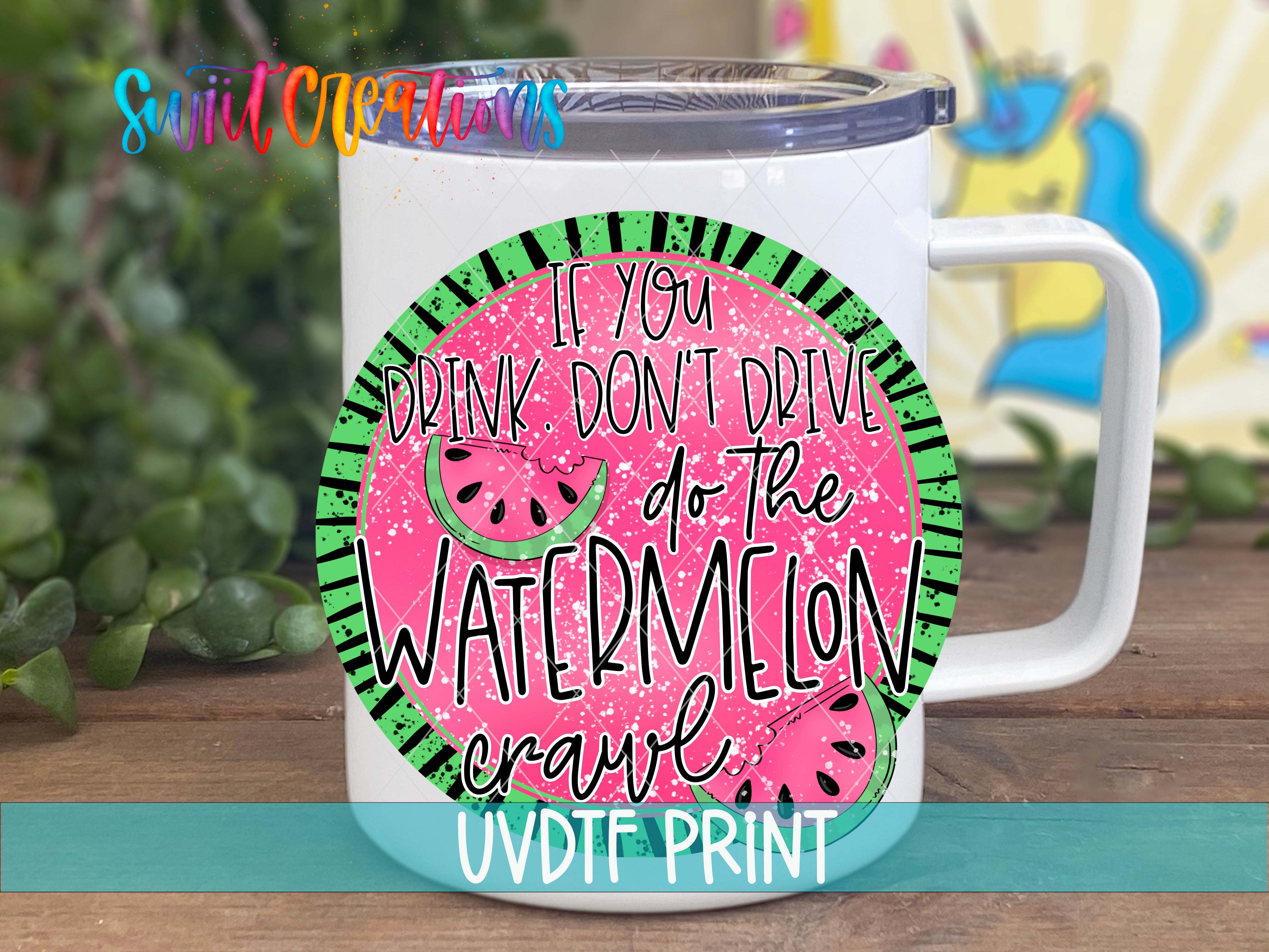A white mug with a colorful design featuring a watermelon slice and the text "If you drink don't drive do the watermelon crawl" printed on it.