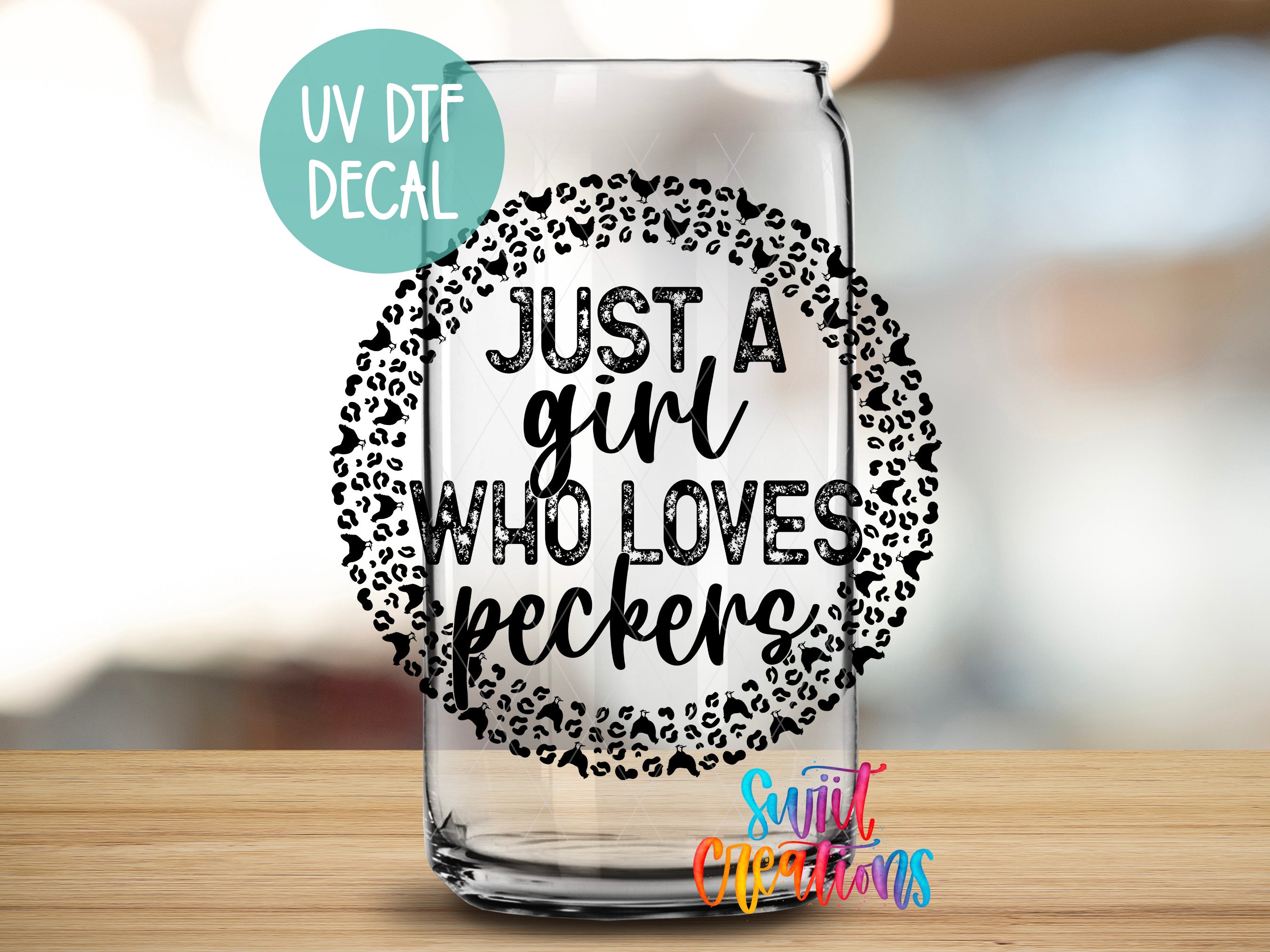 A glass with a leopard print design and text that says "Just a girl who loves peckers"