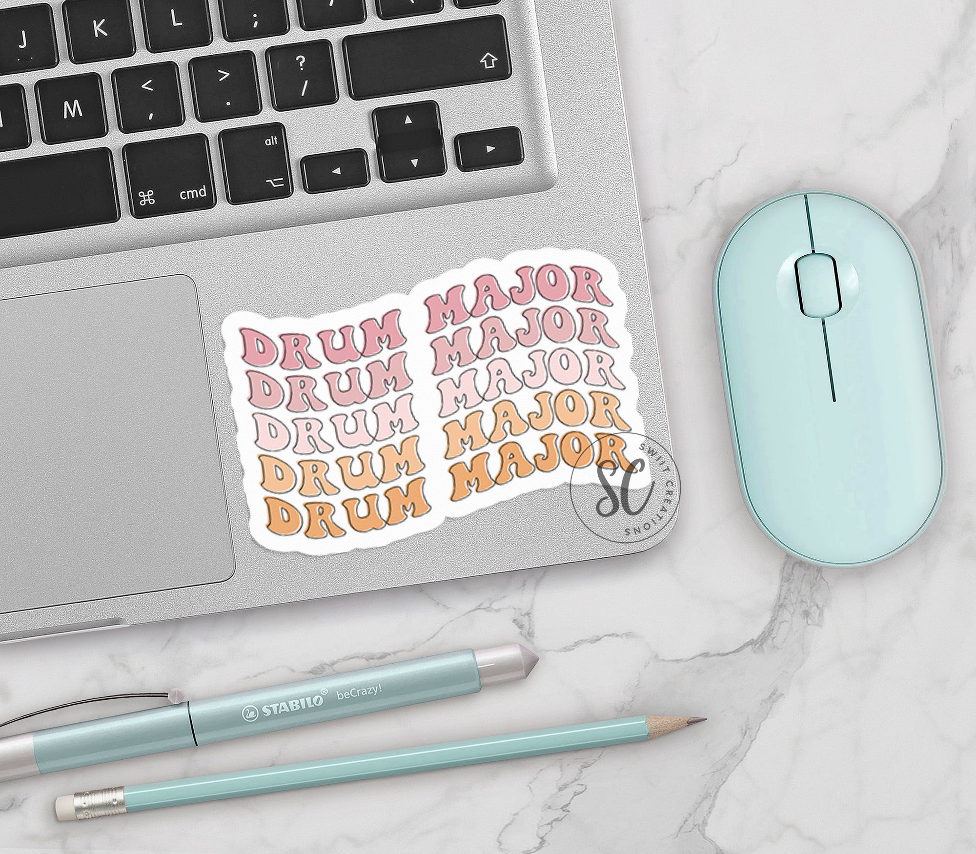 a laptop computer sitting on top of a table