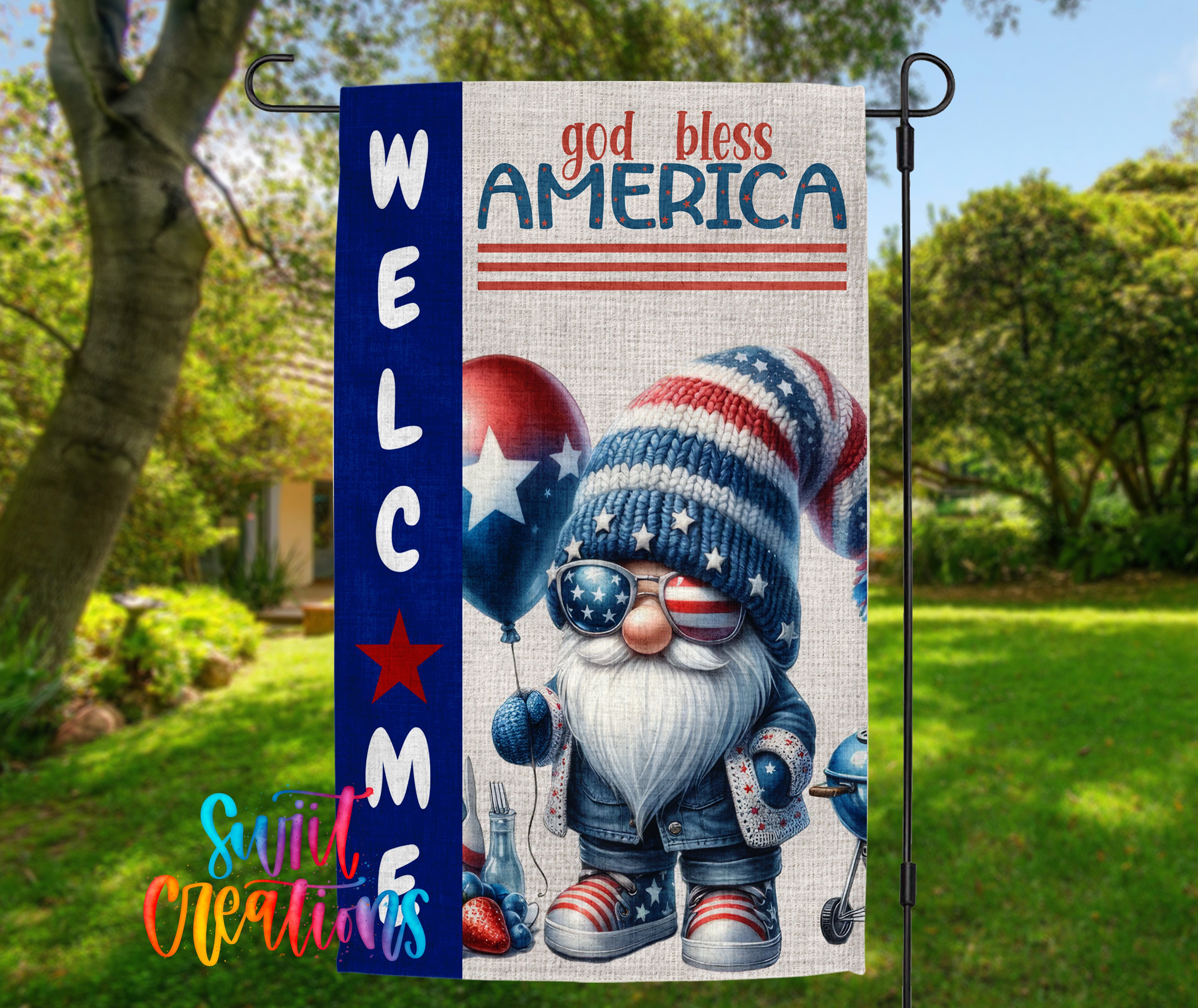 a welcome sign with a gnome wearing patriotic attire, including a hat with an American flag design and sunglasses, holding balloons. The sign also displays the text "God Bless America" and "Welcome" in a patriotic style.