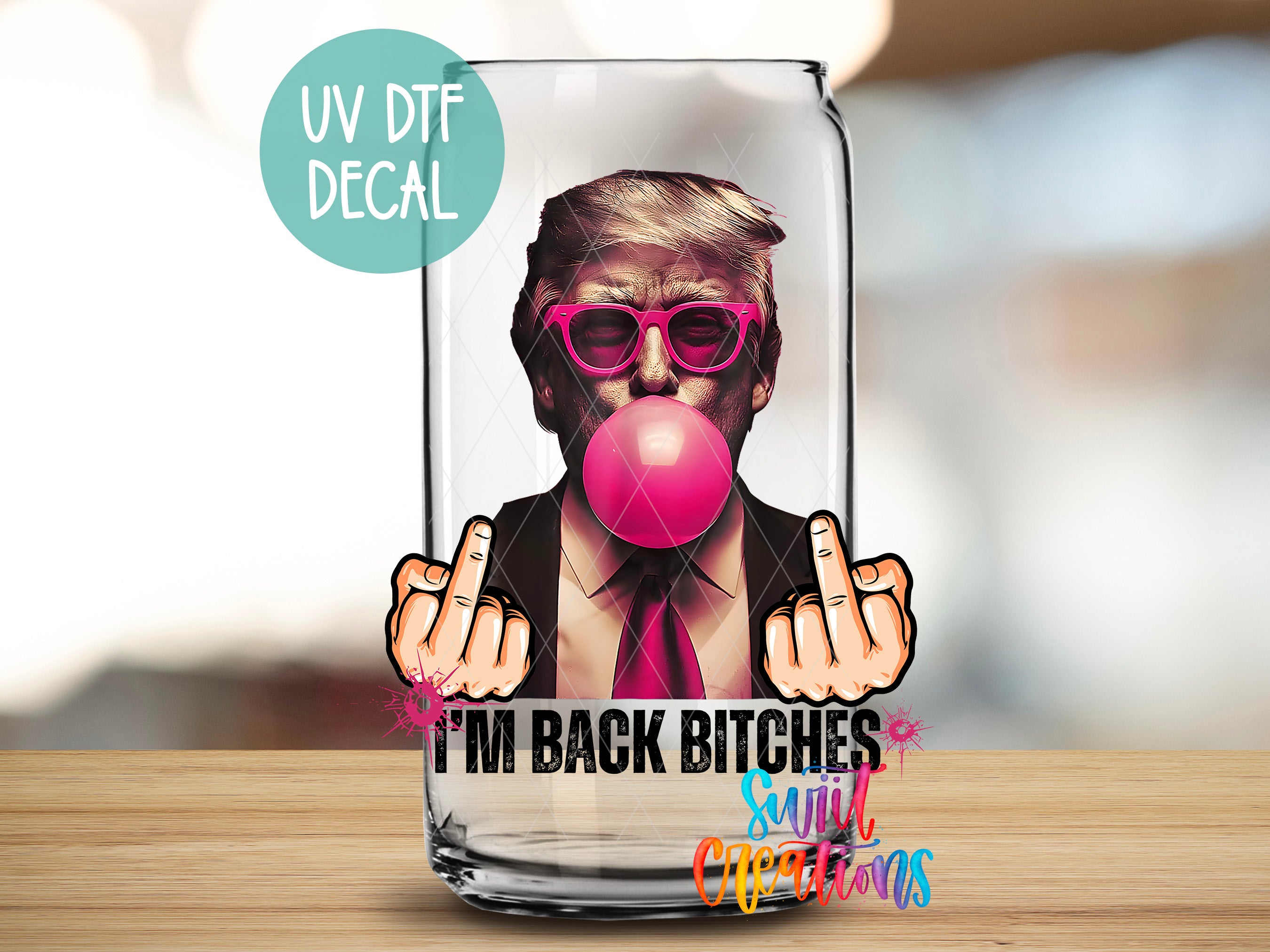 a glass with a picture of a man blowing a bubble