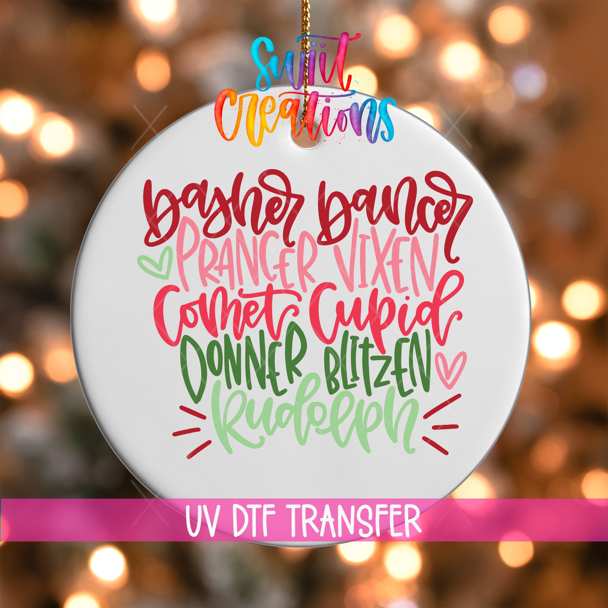A white ornament with colorful text that says "Baker, dancer, prancer, vixen, copet, cupid, donkey, blitzen, rudolph" in a decorative font.