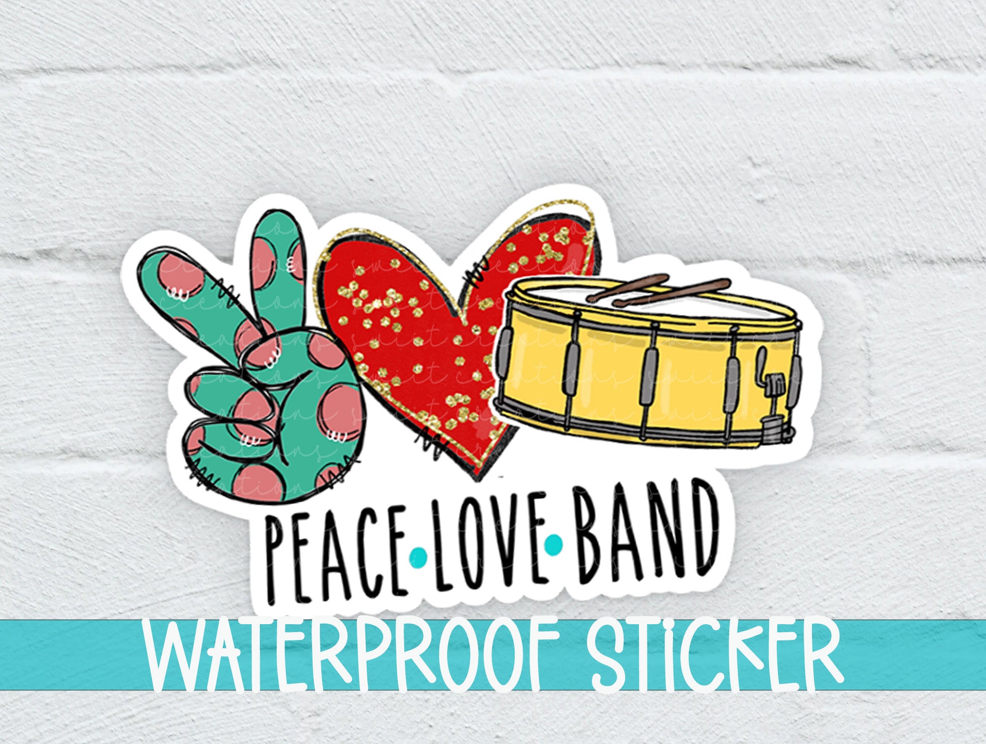 a peace love band sticker on a white brick wall