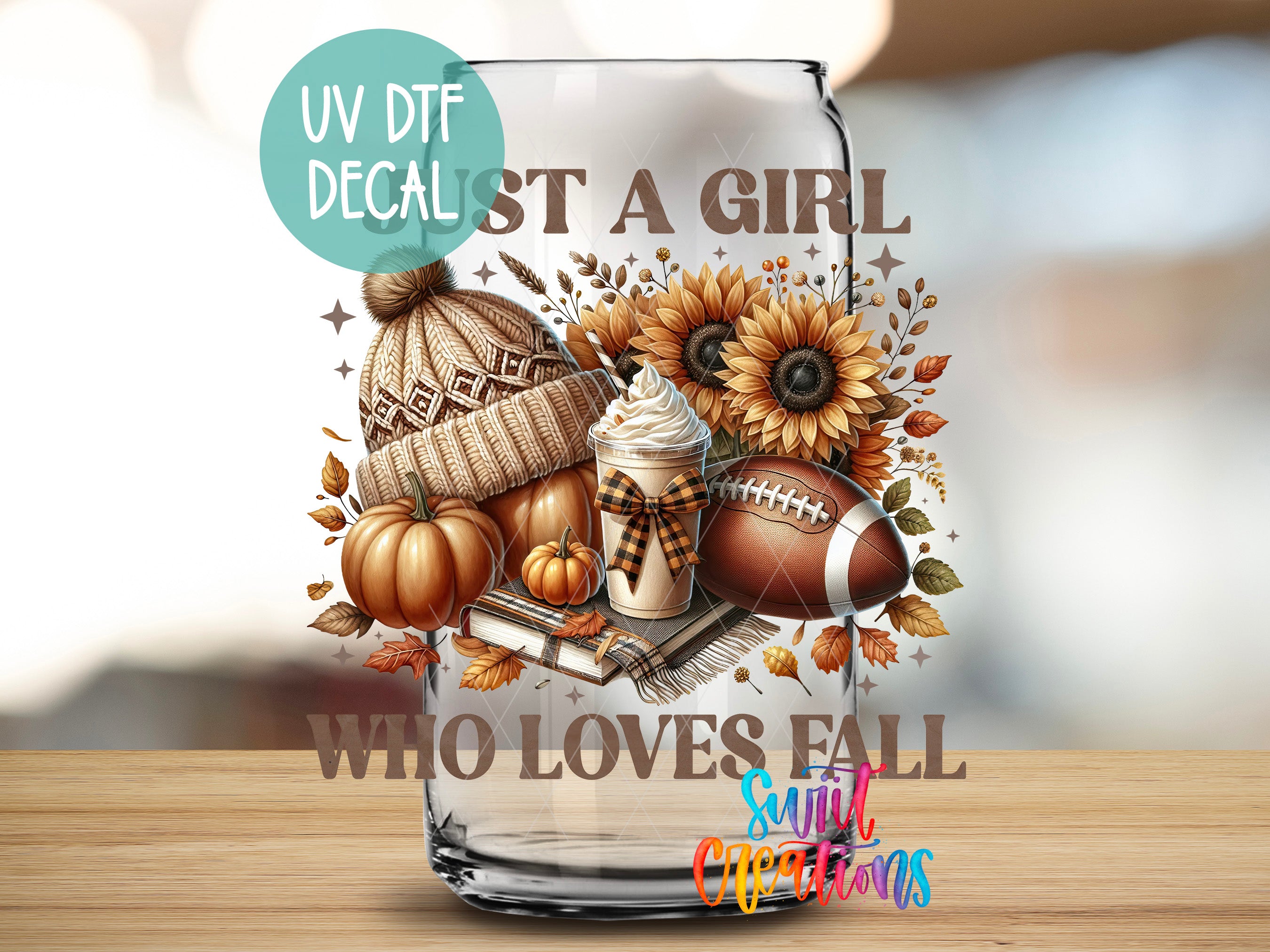 a glass with a picture of a football, sunflowers and a knitted