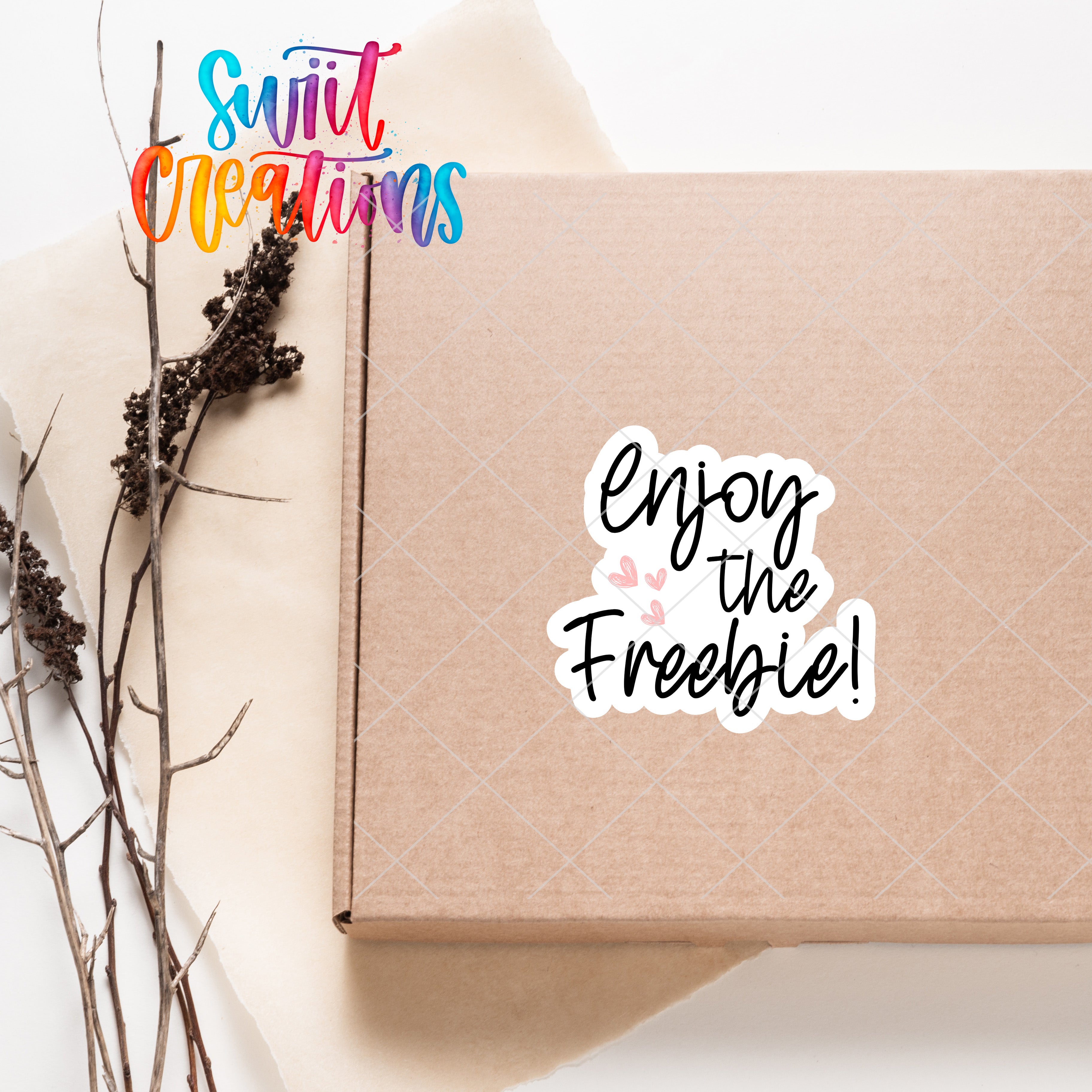 a box with a sticker that says enjoy the freebie