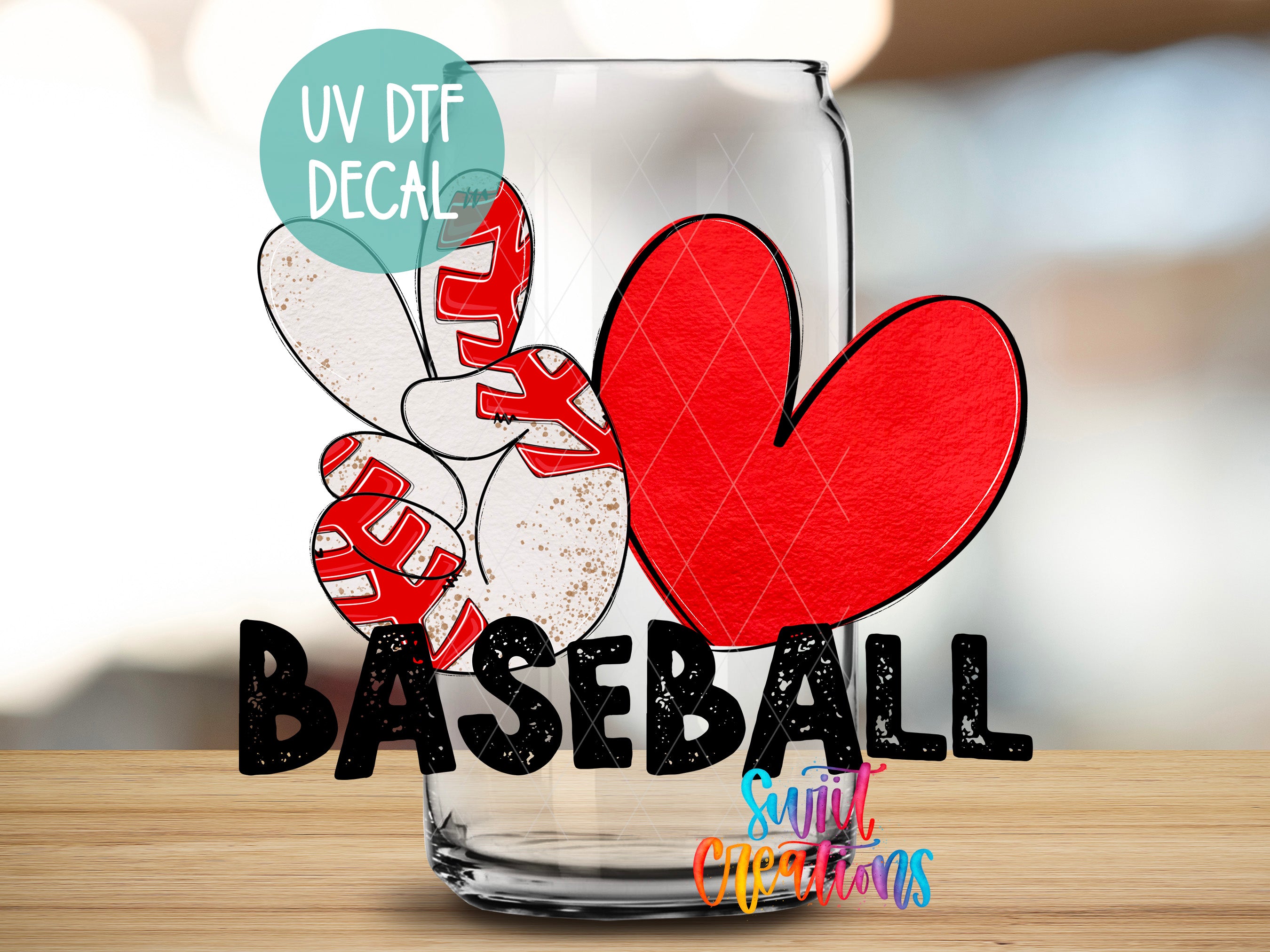 a glass with a baseball-themed decal, including a red heart and the word "BASEBALL" written on it.