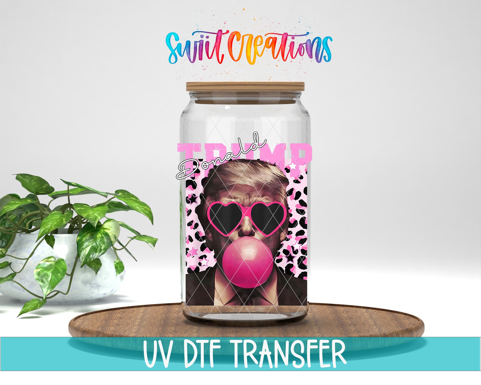 A glass jar with a picture of a person wearing sunglasses and a heart-shaped balloon, along with the text "Trump" and "Don't be like Trump" printed on it. The jar is placed on a wooden surface, and there is a plant in the background.
