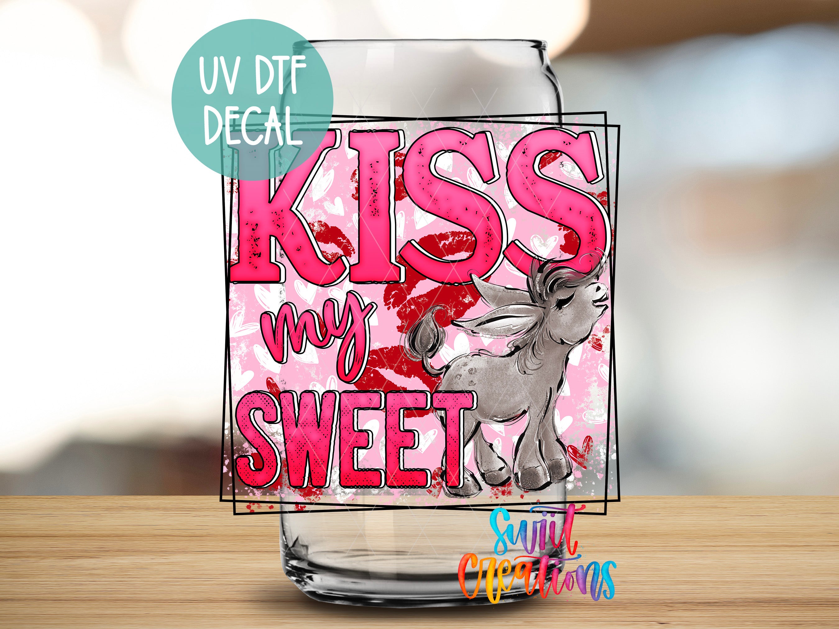 a glass with a picture of an elephant on it