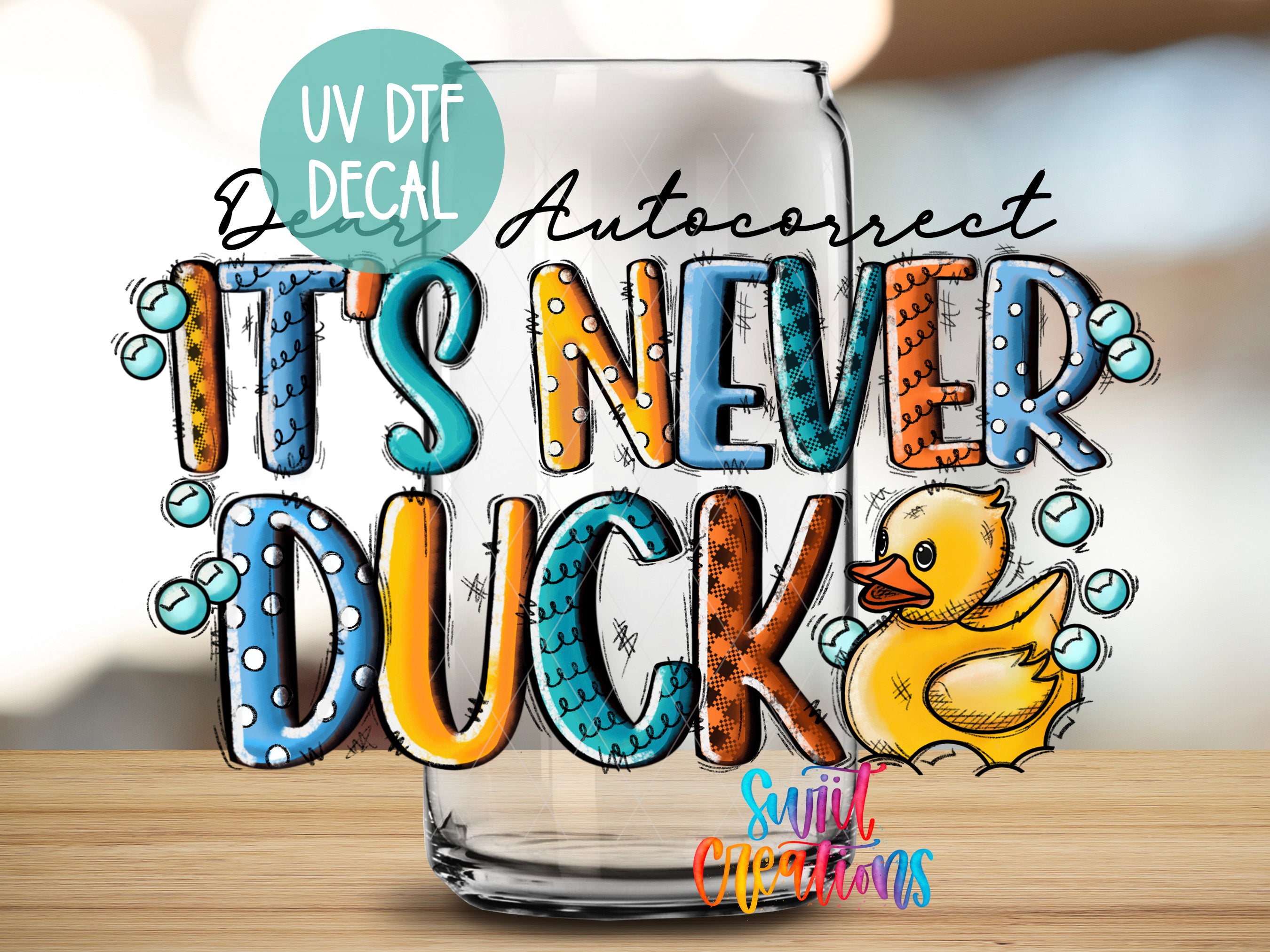 a glass with a rubber duck on it
