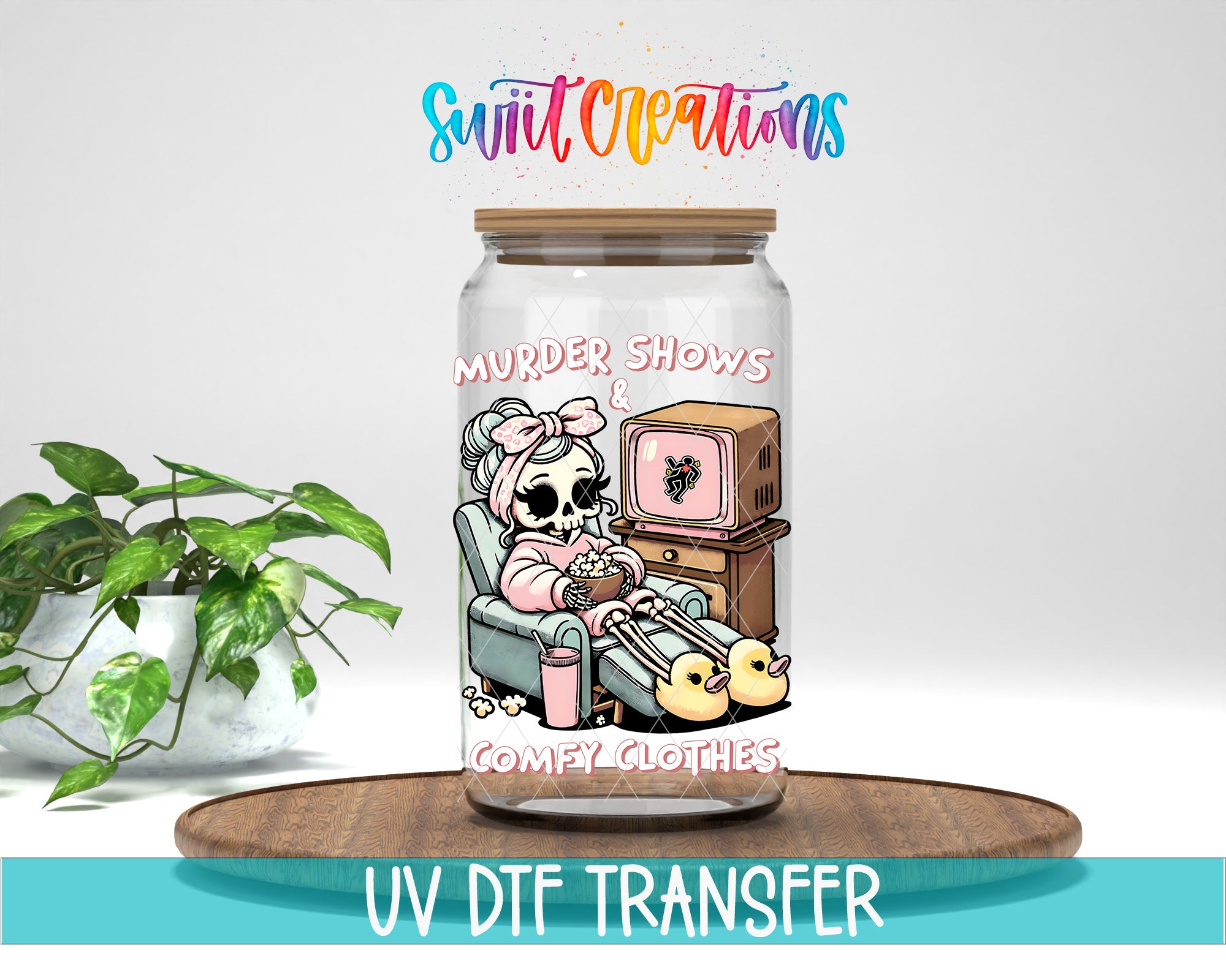 a glass jar with a cartoon illustration of a skeleton wearing a pink outfit and sitting in a chair, with a television and a plant in the background.