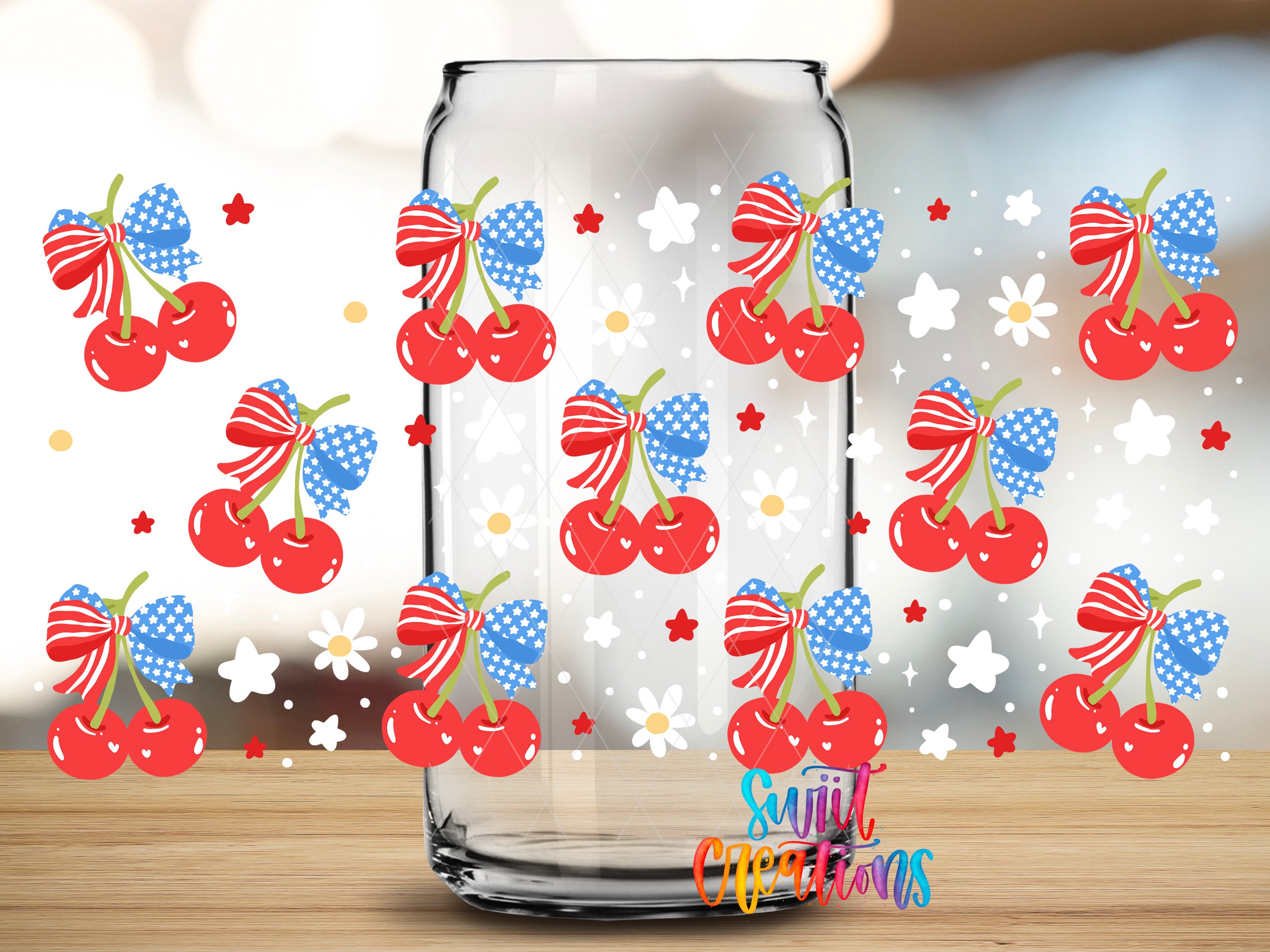 a clear glass jar filled with cherries, each one adorned with a red, white, and blue ribbon, creating a patriotic and festive appearance.