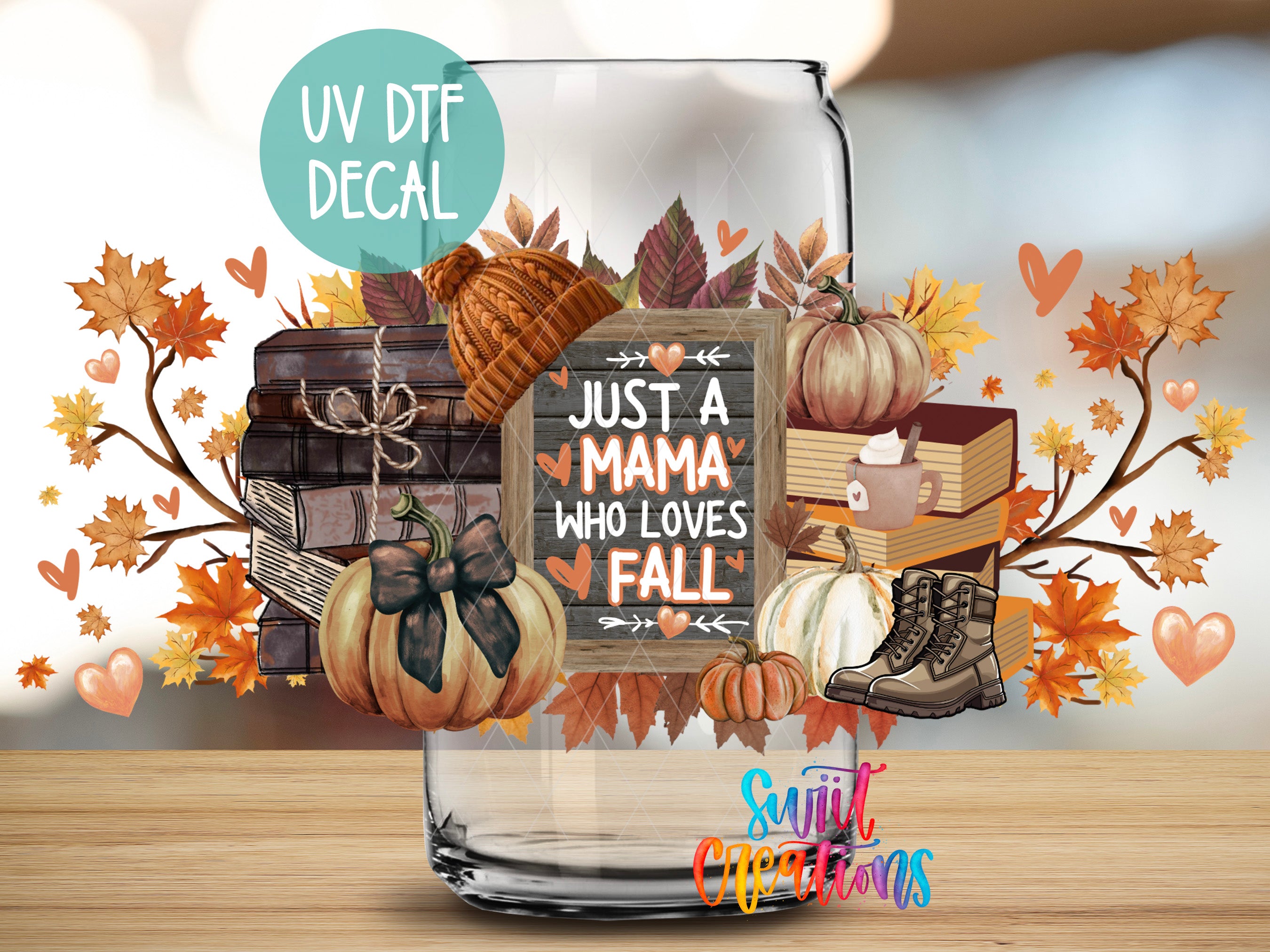 a glass jar filled with autumn-themed items, including pumpkins, books, and a sign that says "Just a Mama who loves fall".