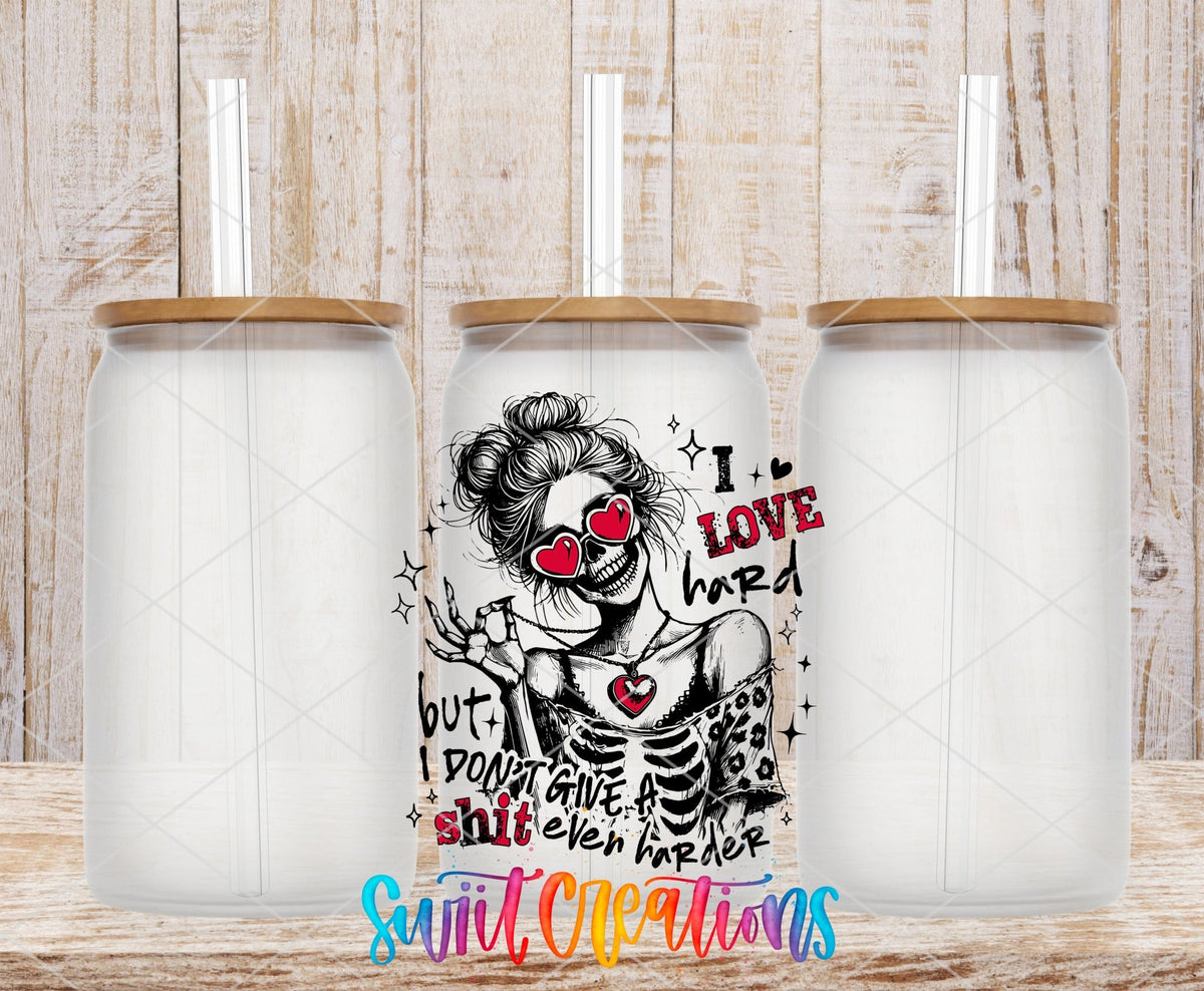 I Love Hard UV DTF transfer applied to a clear glass can set from Swiit Creations