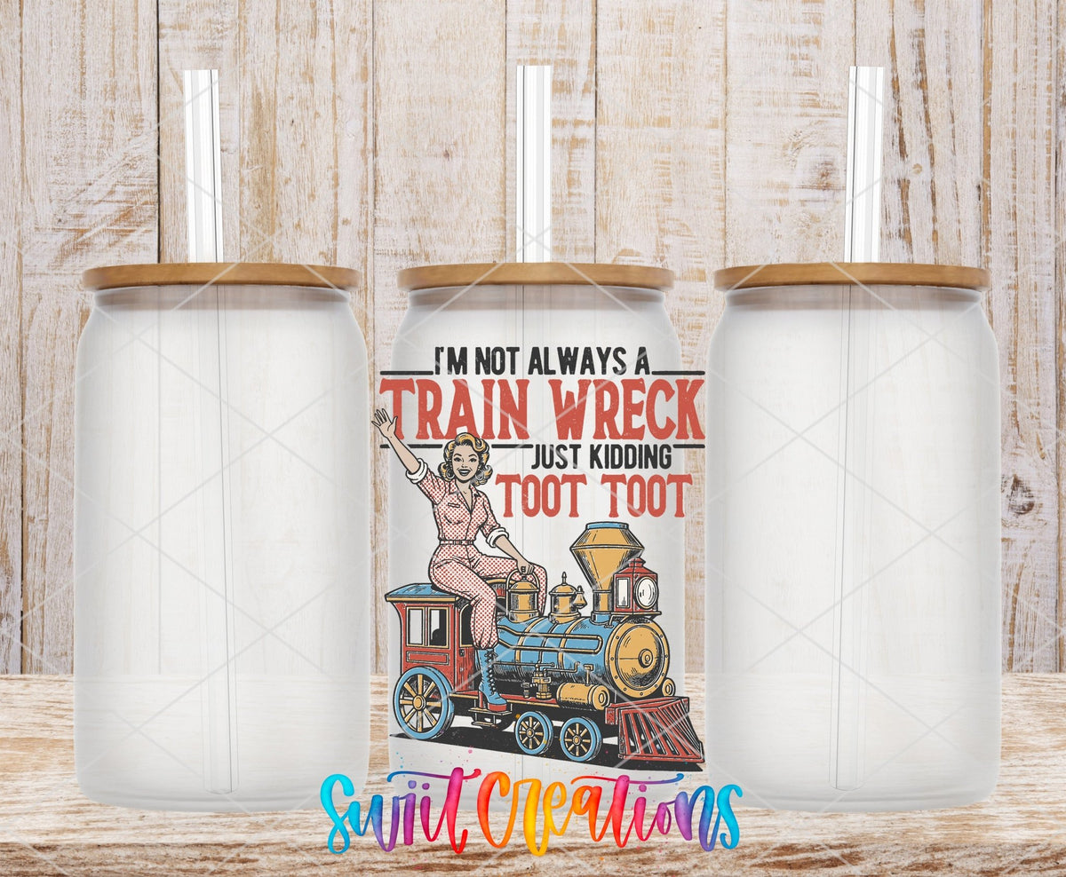 I’m Not Always A Train Wreck UV DTF transfer applied to a clear glass can set from Swiit Creations