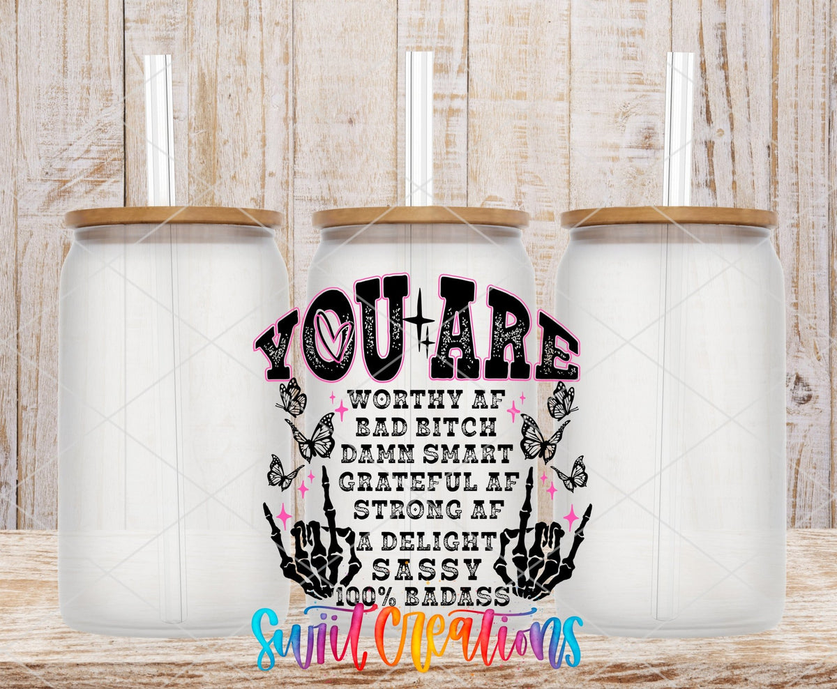 Inspirational You Are a Badass UV DTF transfer applied to a clear glass can set from Swiit Creations
