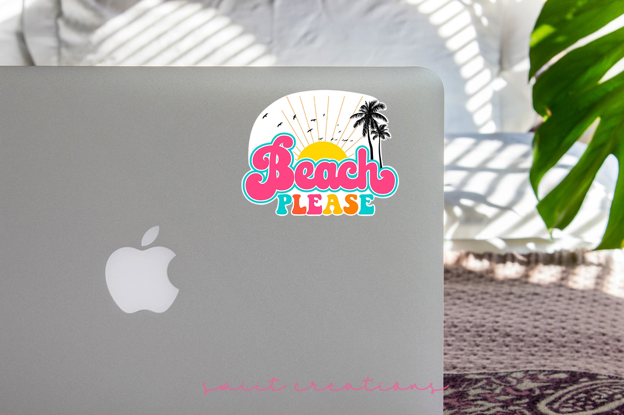 a laptop computer sitting on top of a table