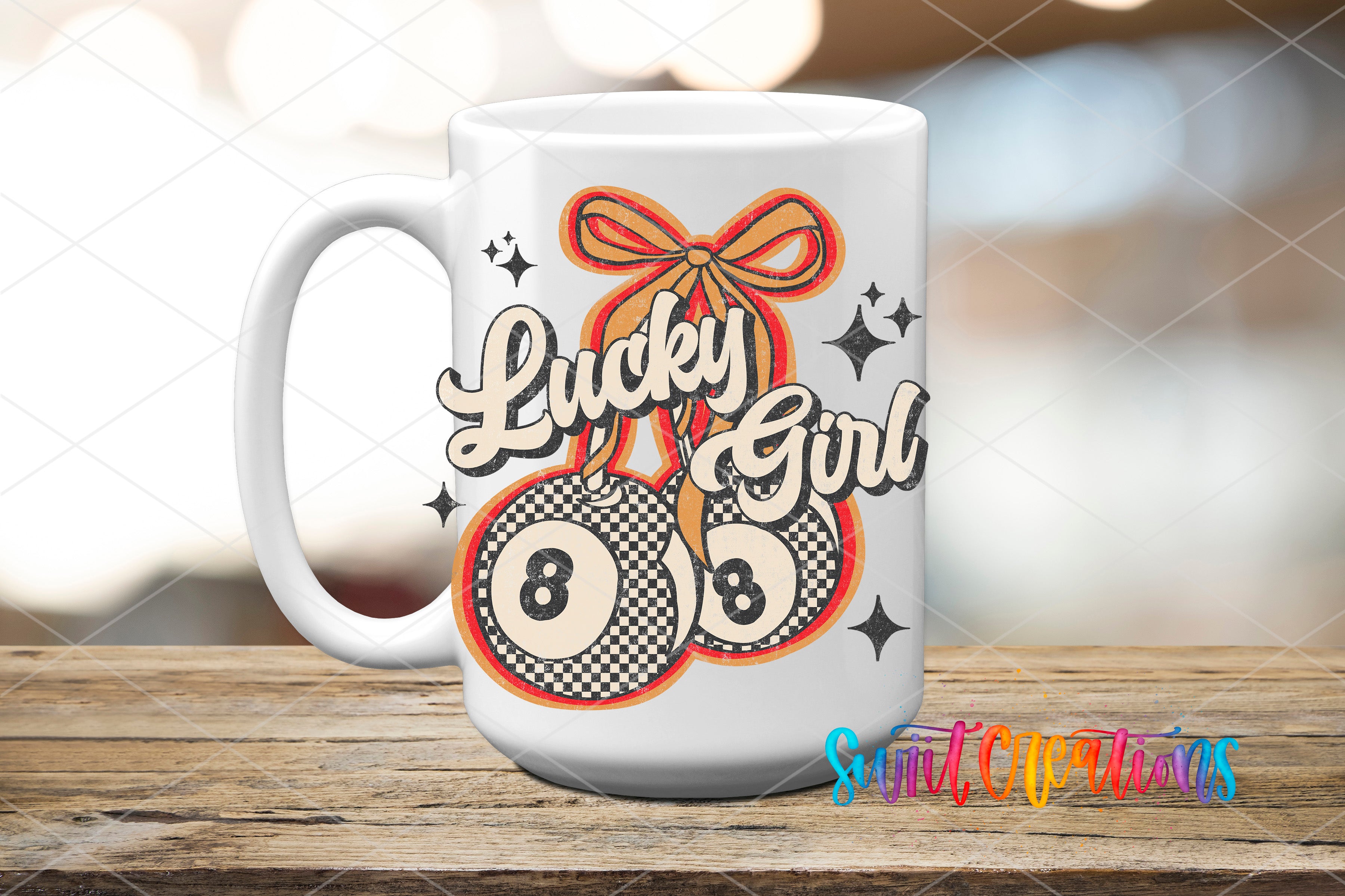 A white mug with a colorful design featuring a ribbon, pool balls, and the text "Lucky Girl" on it.