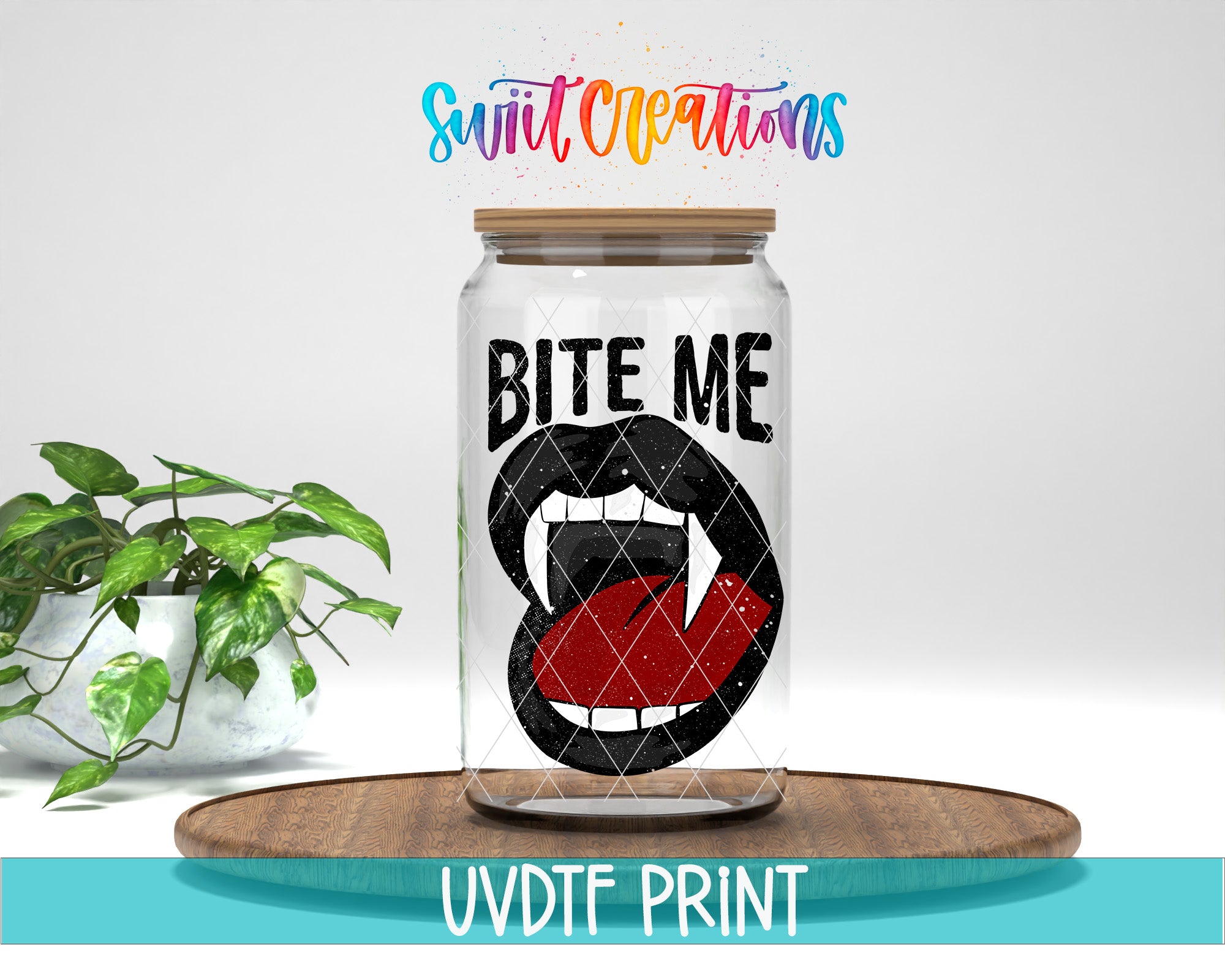 a glass jar with a graphic of a mouth with fangs and the text "BITE ME" on it, placed on a wooden surface. There is also a potted plant in the background.