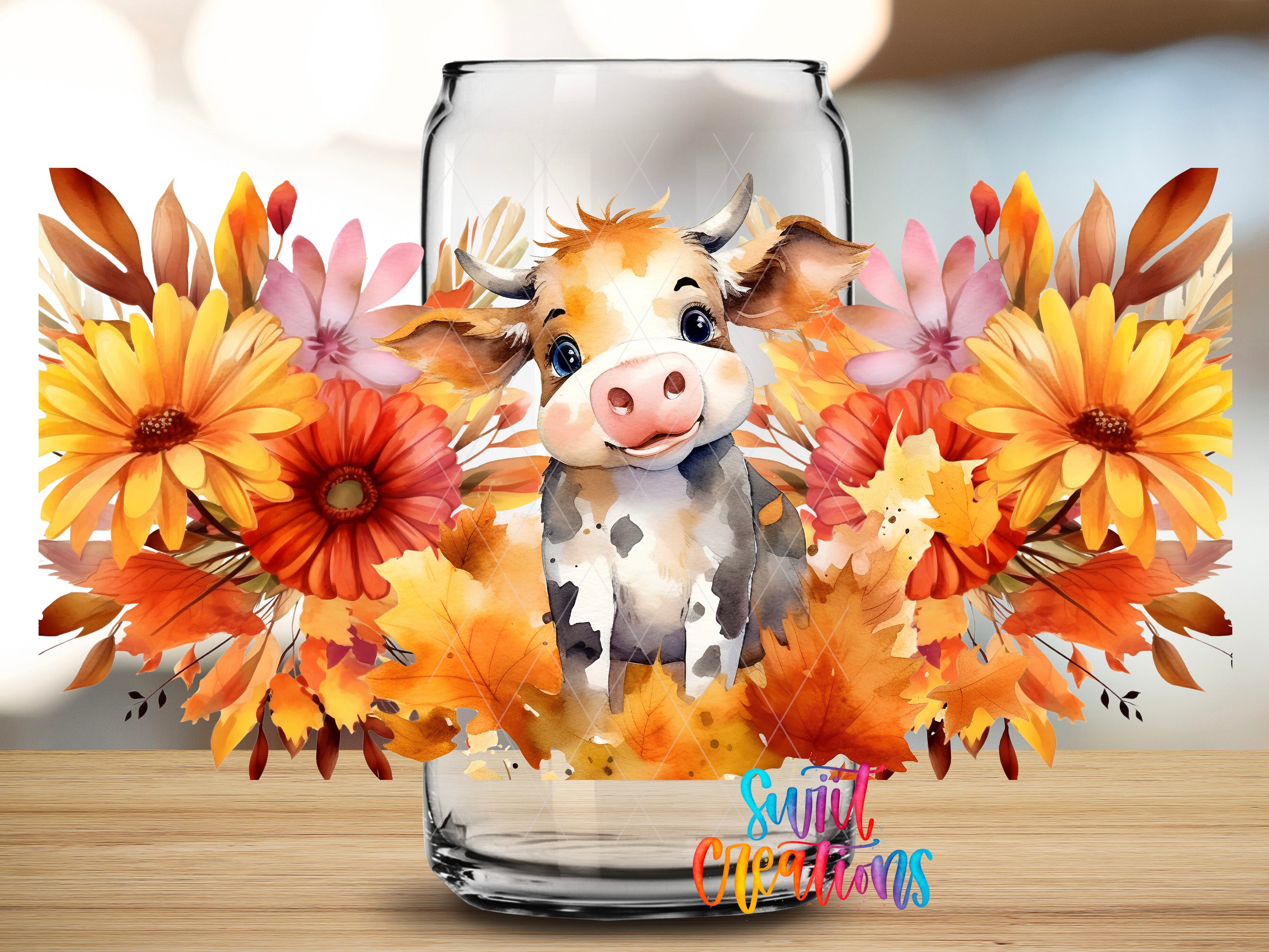 A glass jar filled with autumn leaves and flowers, featuring a cartoon cow peeking out from behind the leaves.