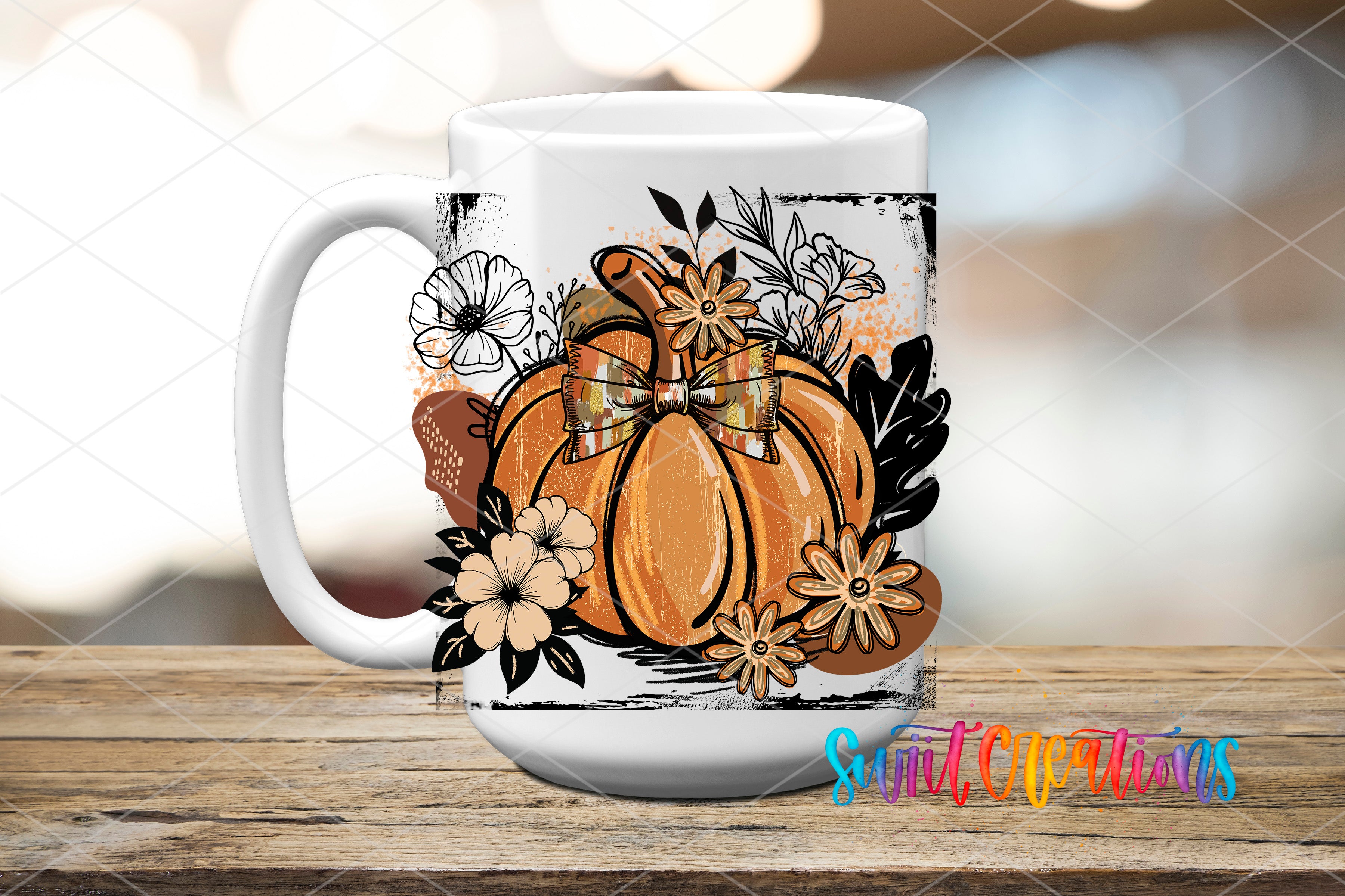 A white ceramic mug with a pumpkin design and floral elements on it, placed on a wooden surface.