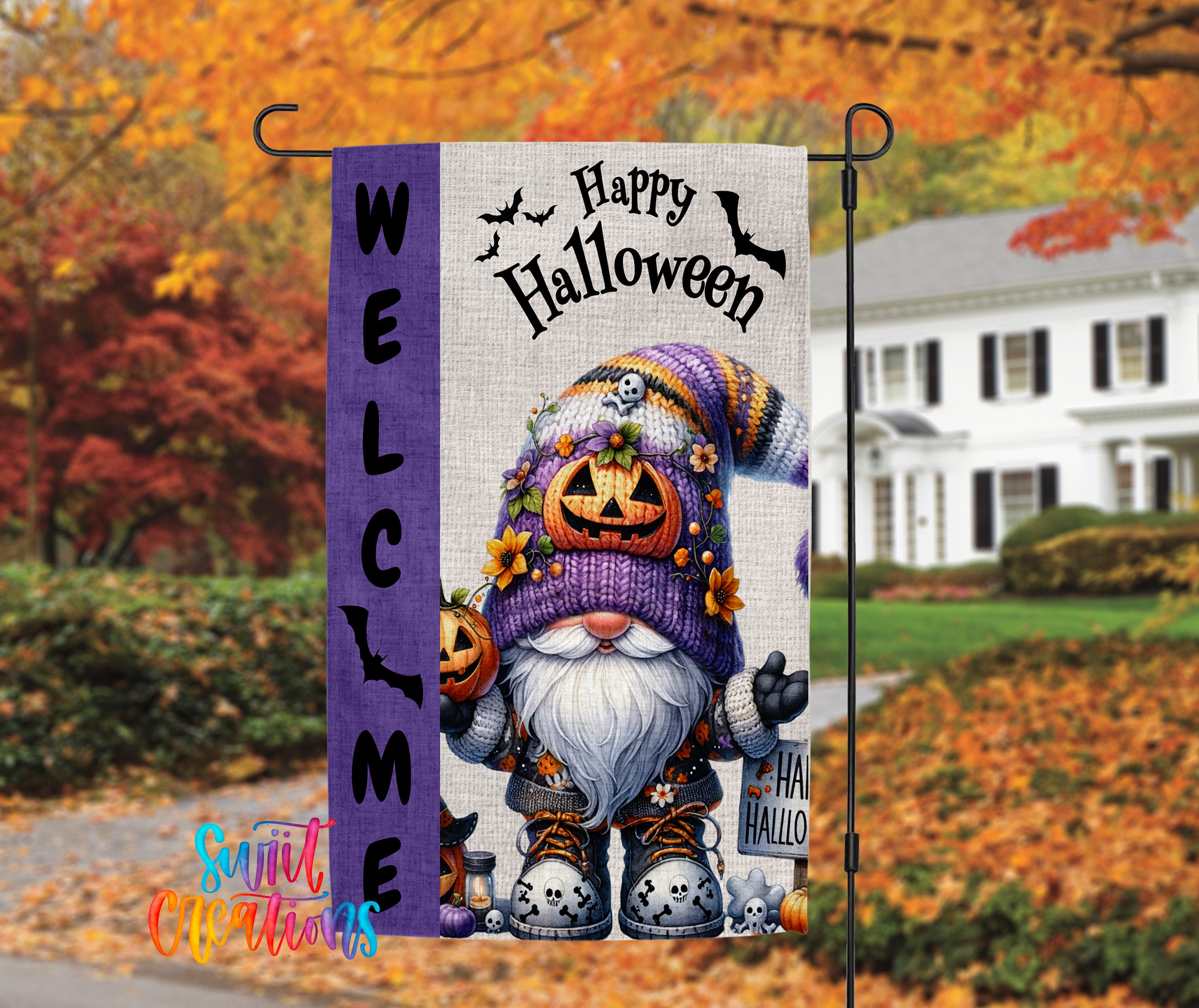 A Halloween-themed welcome sign featuring a gnome character with a pumpkin hat and scarf, standing in front of a house with autumn foliage in the background.