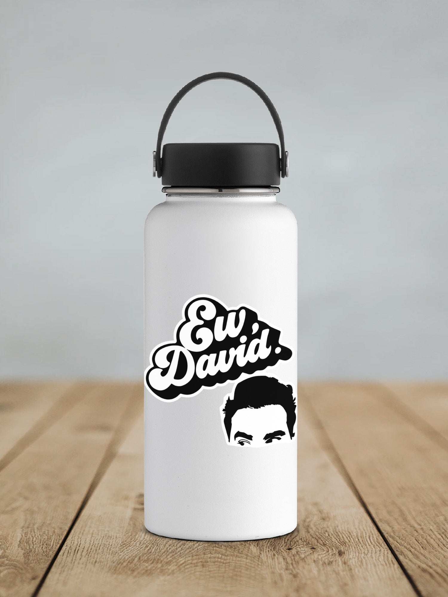 a white water bottle with a picture of a man's face on it