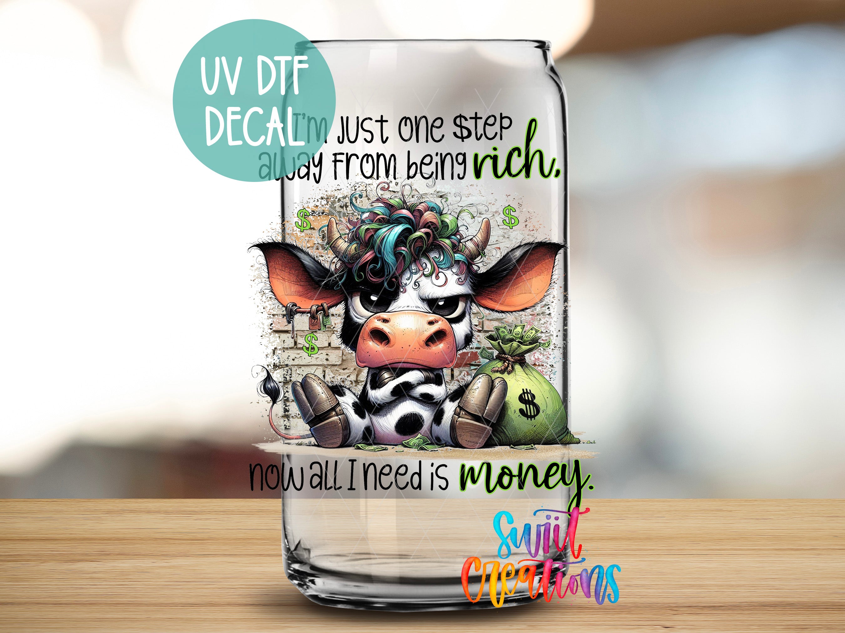 a glass with a picture of a cow on it