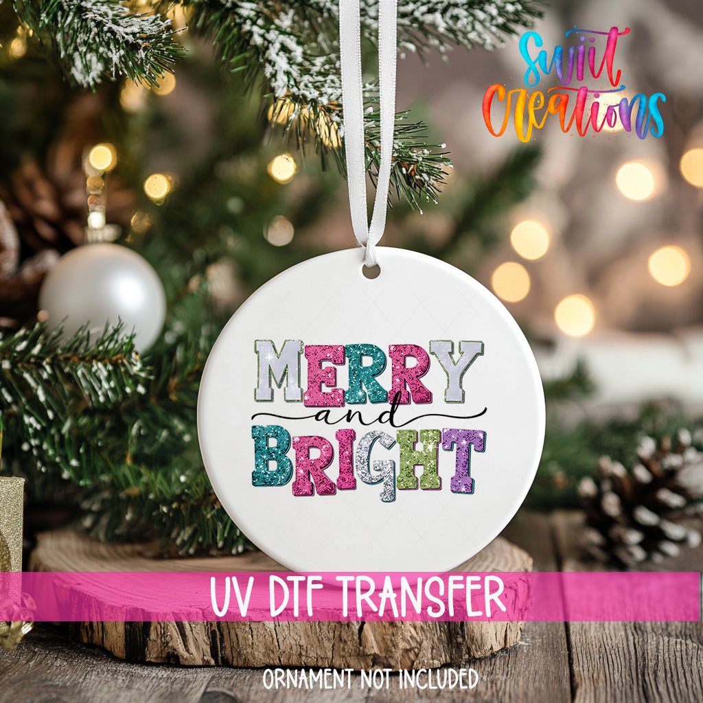 A white ornament with the text "MERRY and BRIGHT" in colorful letters hangs from a Christmas tree.