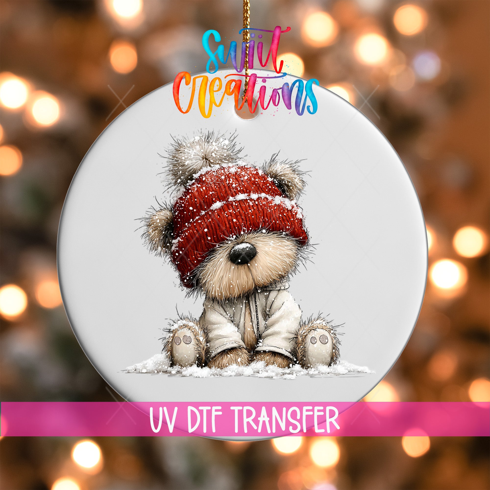 A white ornament with a cute teddy bear wearing a red hat and sitting in the snow.