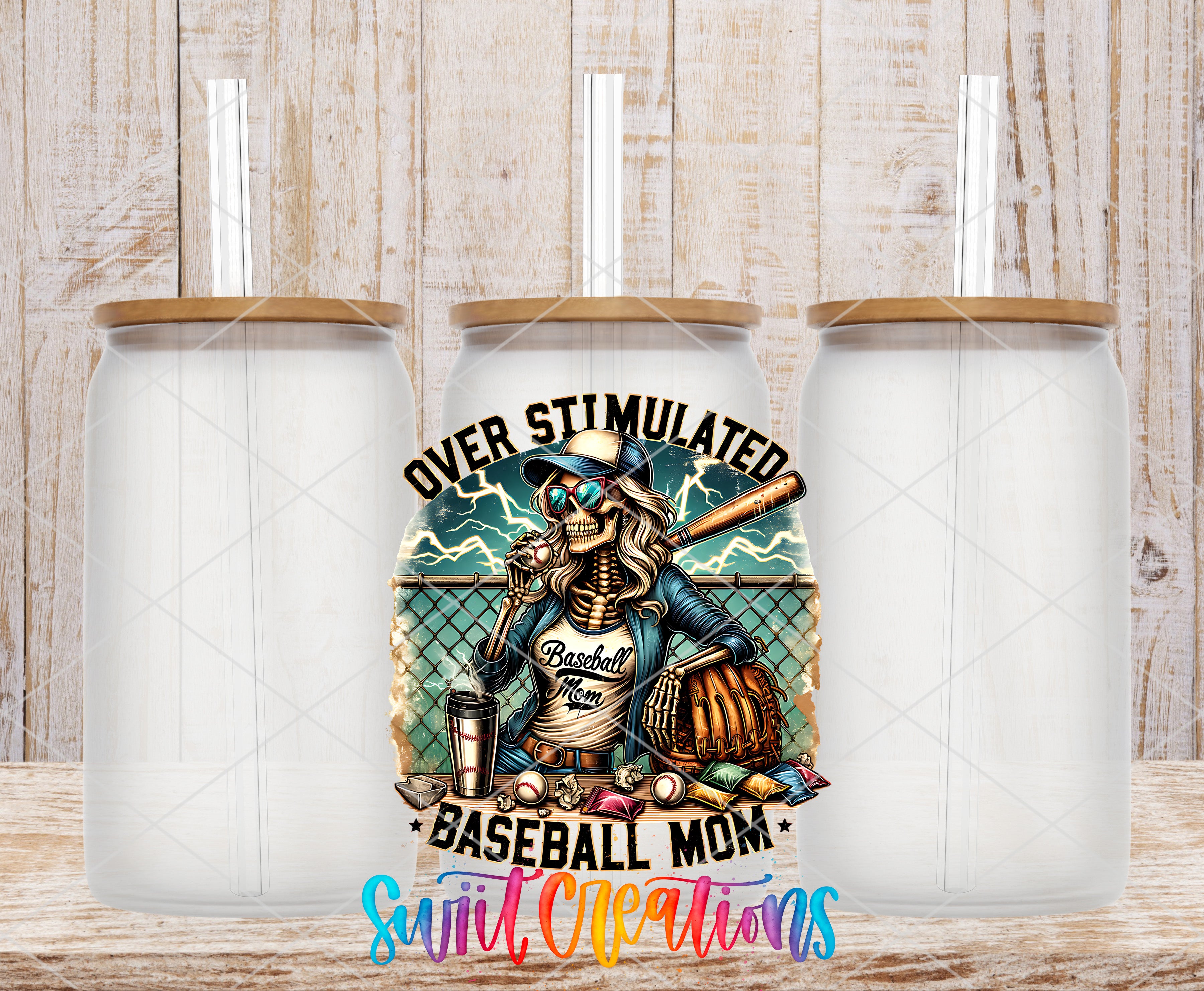 a tumbler with a baseball-themed design, including a skeleton holding a baseball bat and a baseball glove, along with the text "Over Stimulated Baseball Mom" and "Swift Creations".