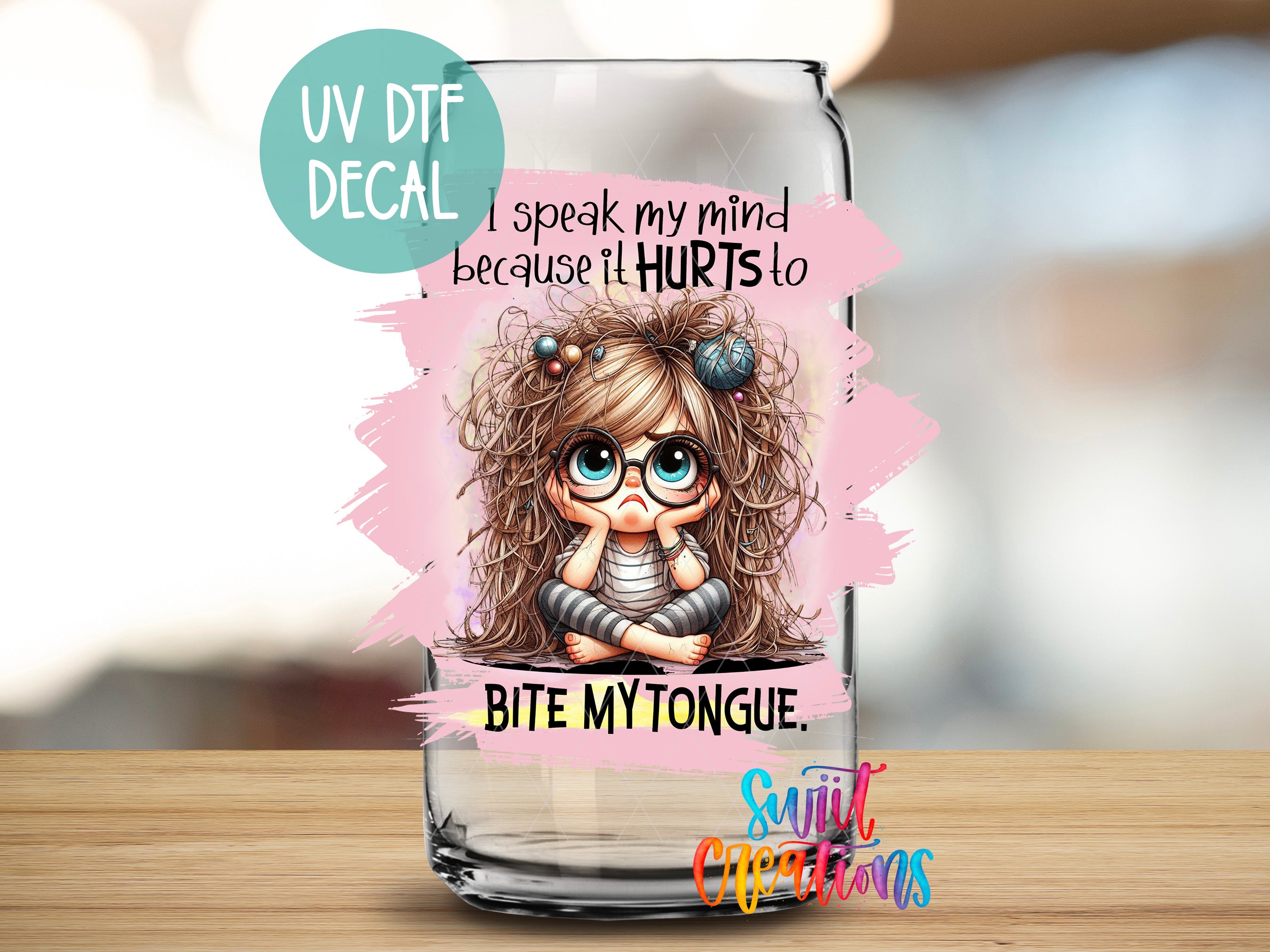 a glass with a picture of a girl on it