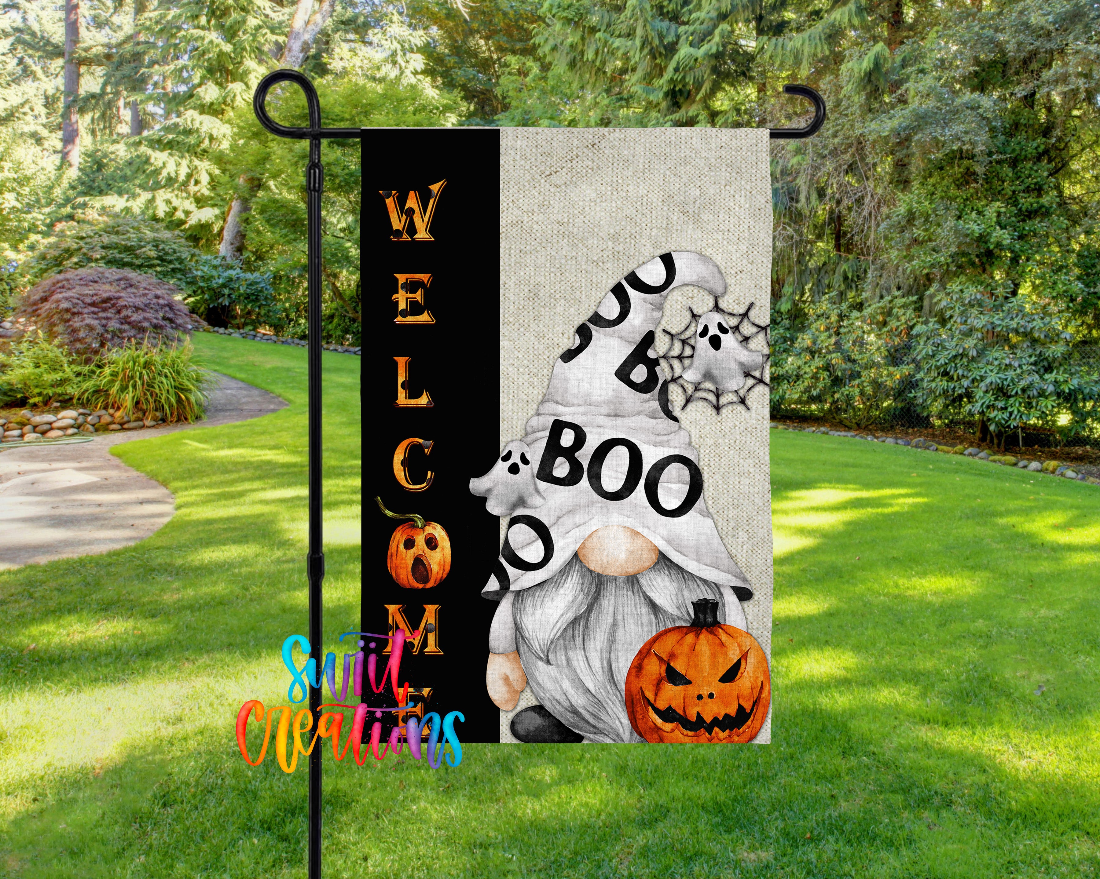 A Halloween-themed garden flag featuring a gnome holding a carved pumpkin and a spider web.