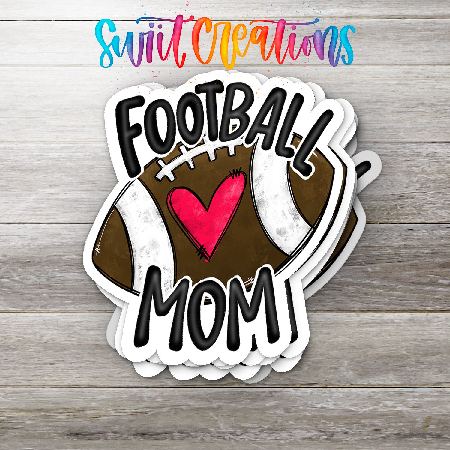 A stack of football-themed stickers with the text "FOOTBALL MOM!" printed on them.