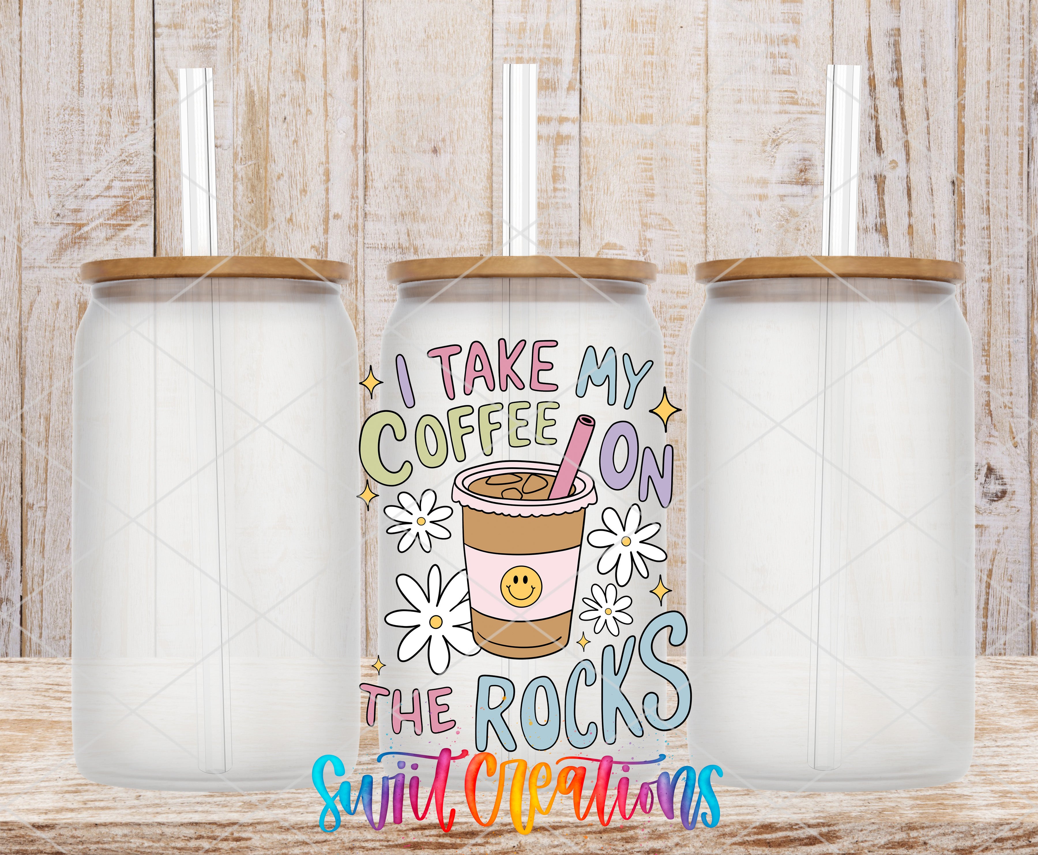a colorful cup with a straw, accompanied by the text "I TAKE MY COFFEE ON THE ROCKS" and a smiley face.