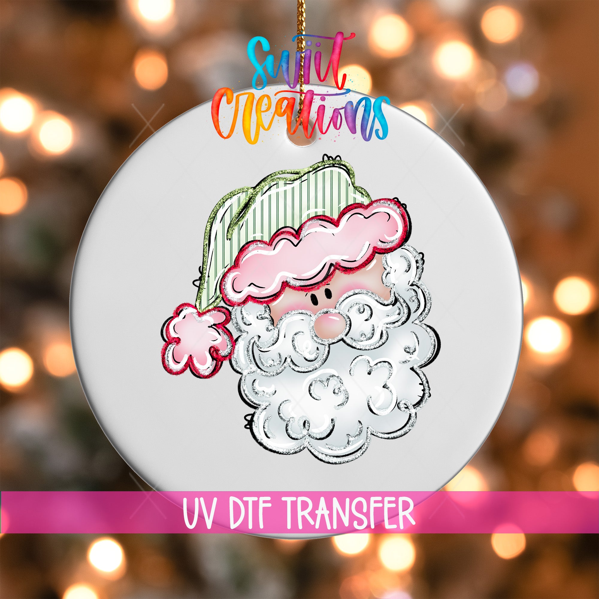 A white ornament with a cartoon Santa Claus face and a pink hat, along with the text "UV Dtf Transfer" and "Sweet Creations" written above it.
