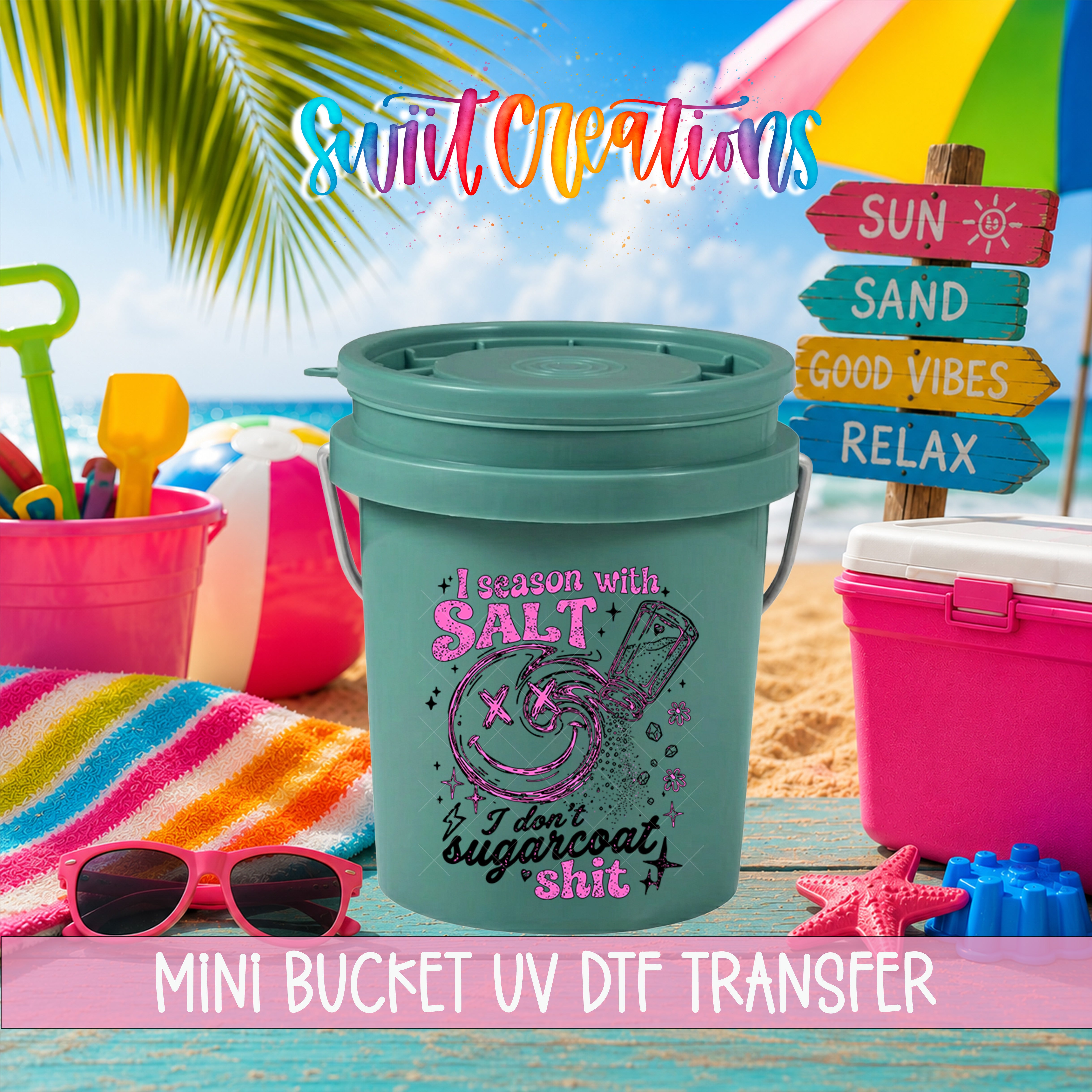 A colorful beach scene with a bucket labeled "I season with salt" and a "Mini Bucket UV Dtf Transfer" sign, along with beach toys and a palm tree.