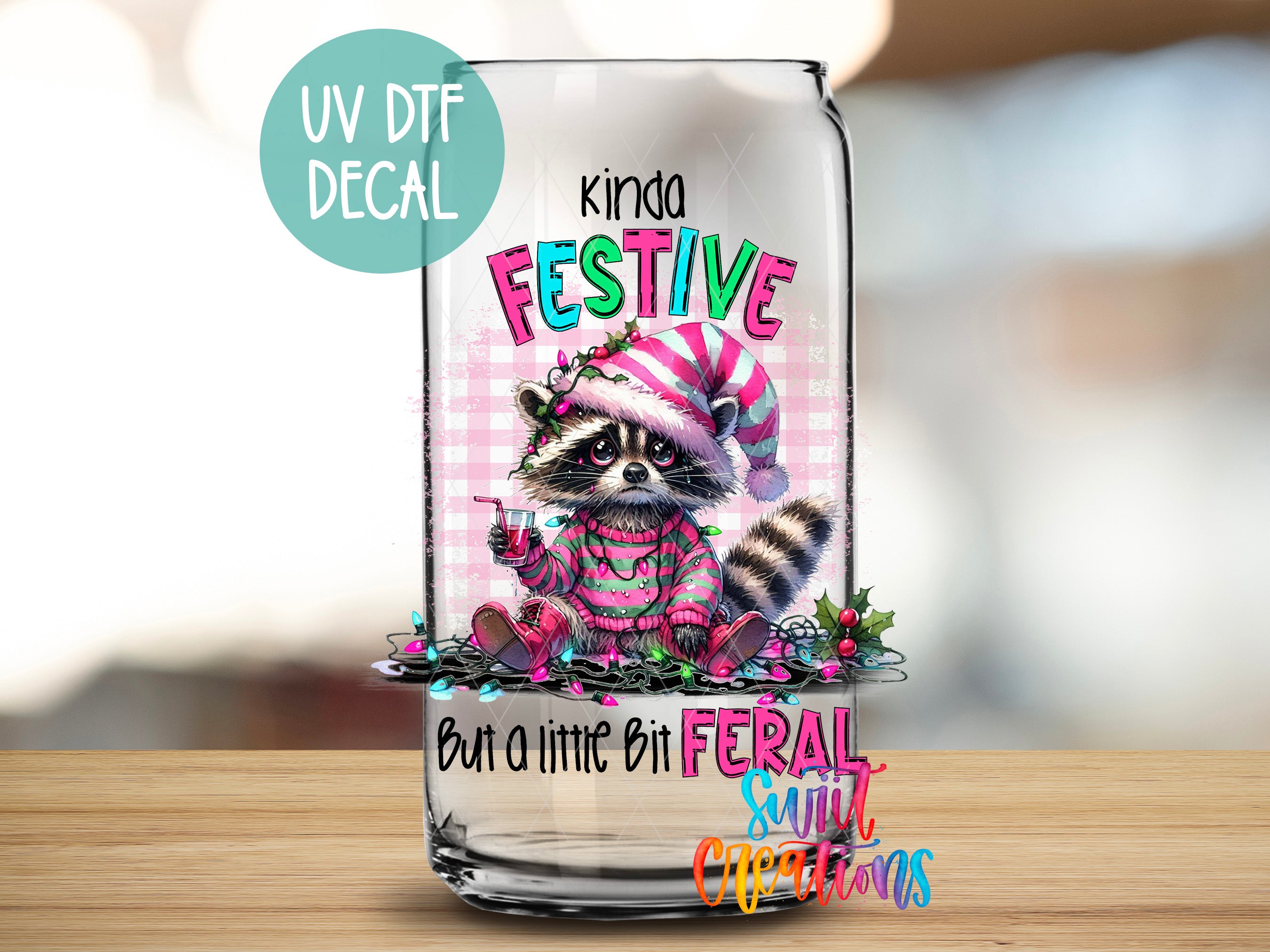 a glass with a raccoon wearing a pink hat