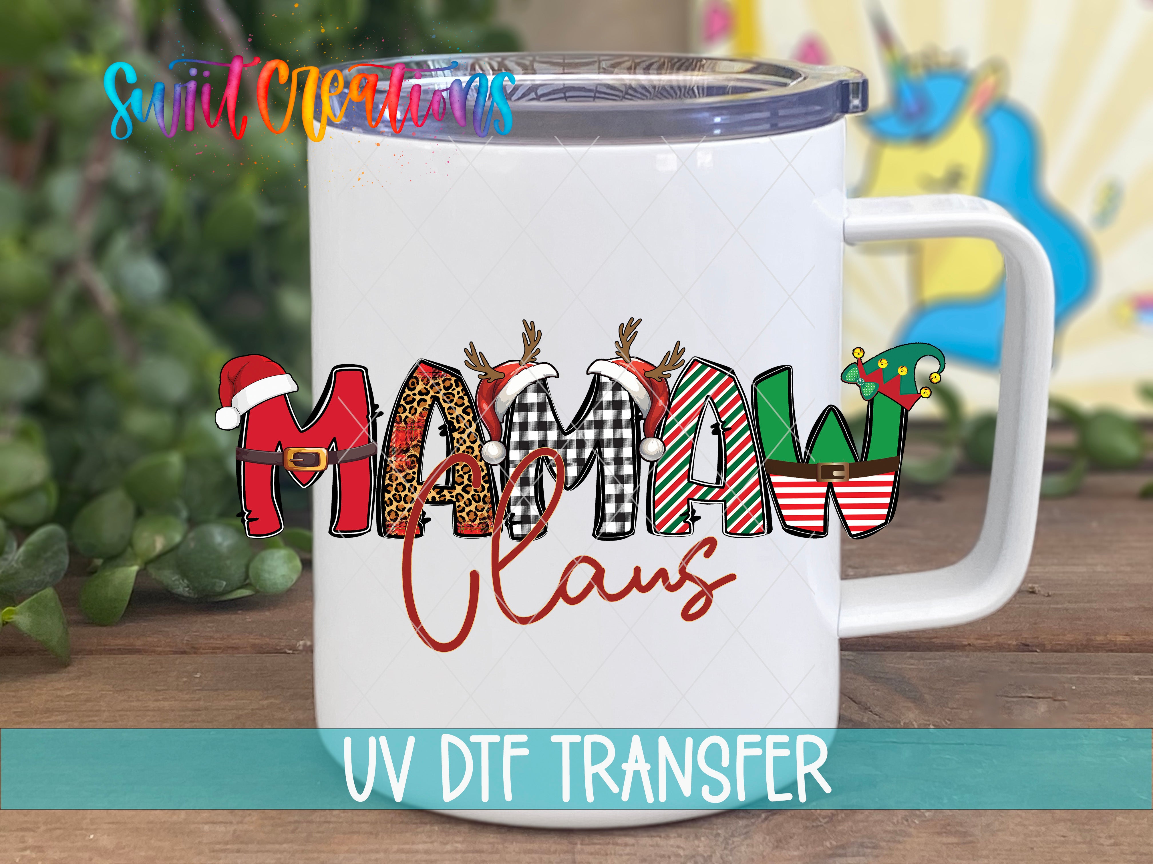 A white mug with a colorful design featuring the text "MAMMA CLAWS" in a stylized font.