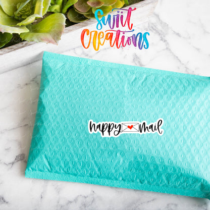 a blue envelope with a happy new year sticker on it