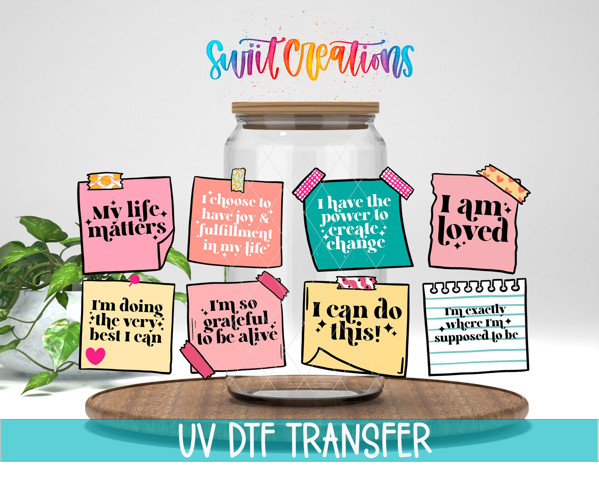 The image is a colorful and vibrant representation of a jar filled with positive affirmations and quotes, accompanied by a plant and a wooden board.