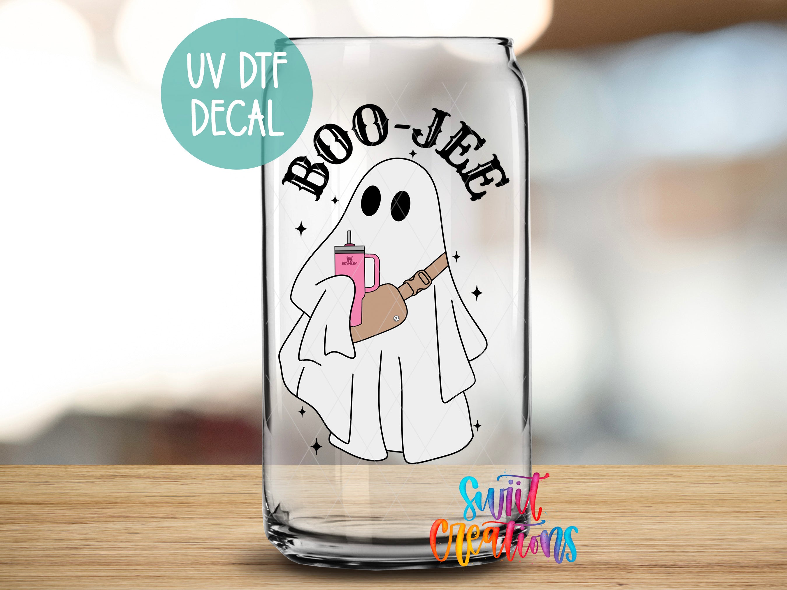 a glass with a picture of a ghost holding a drink