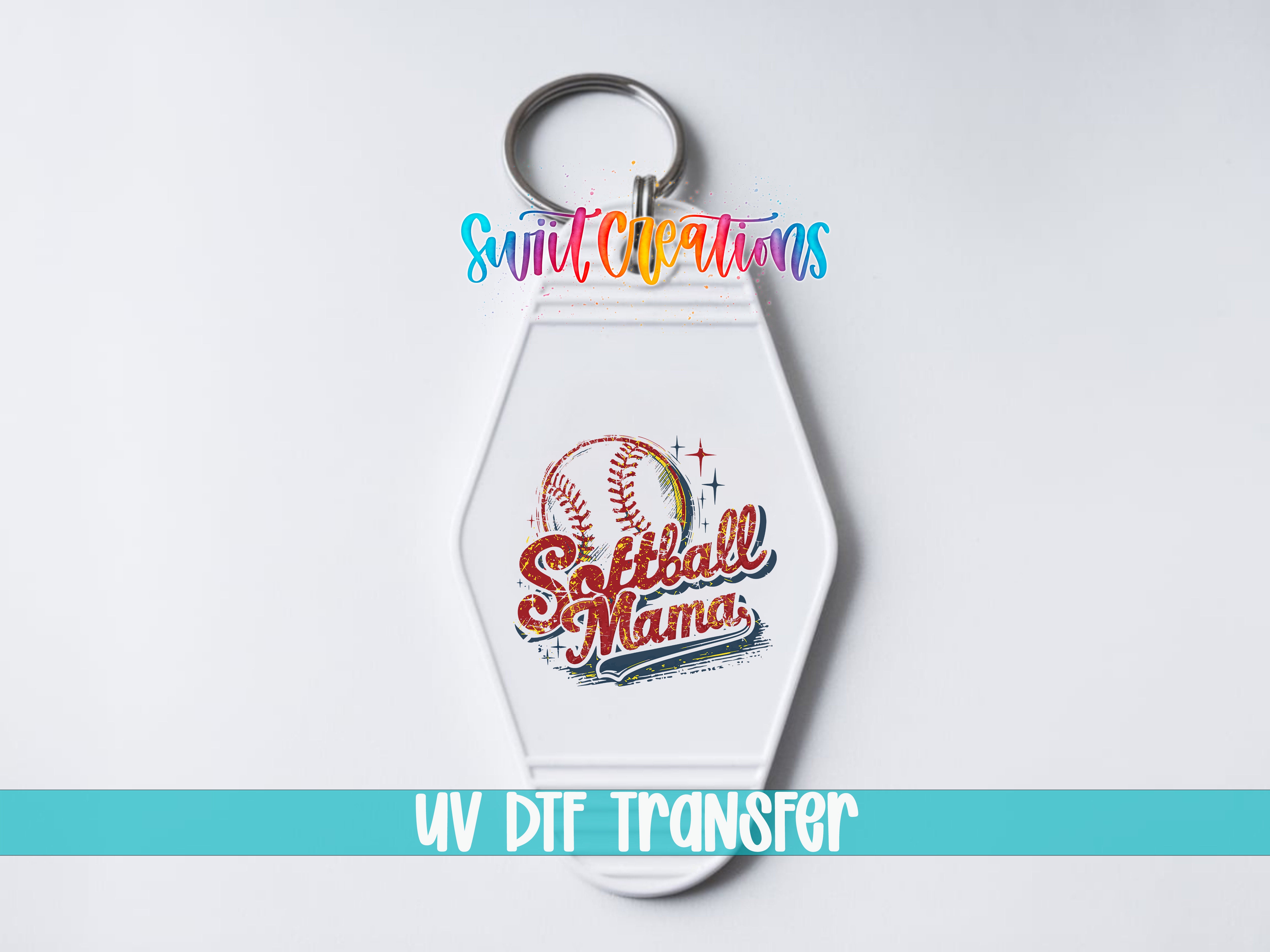 A keychain with a baseball and softball design, along with the text "Softball Mama" and the UV DDF Transfer logo.