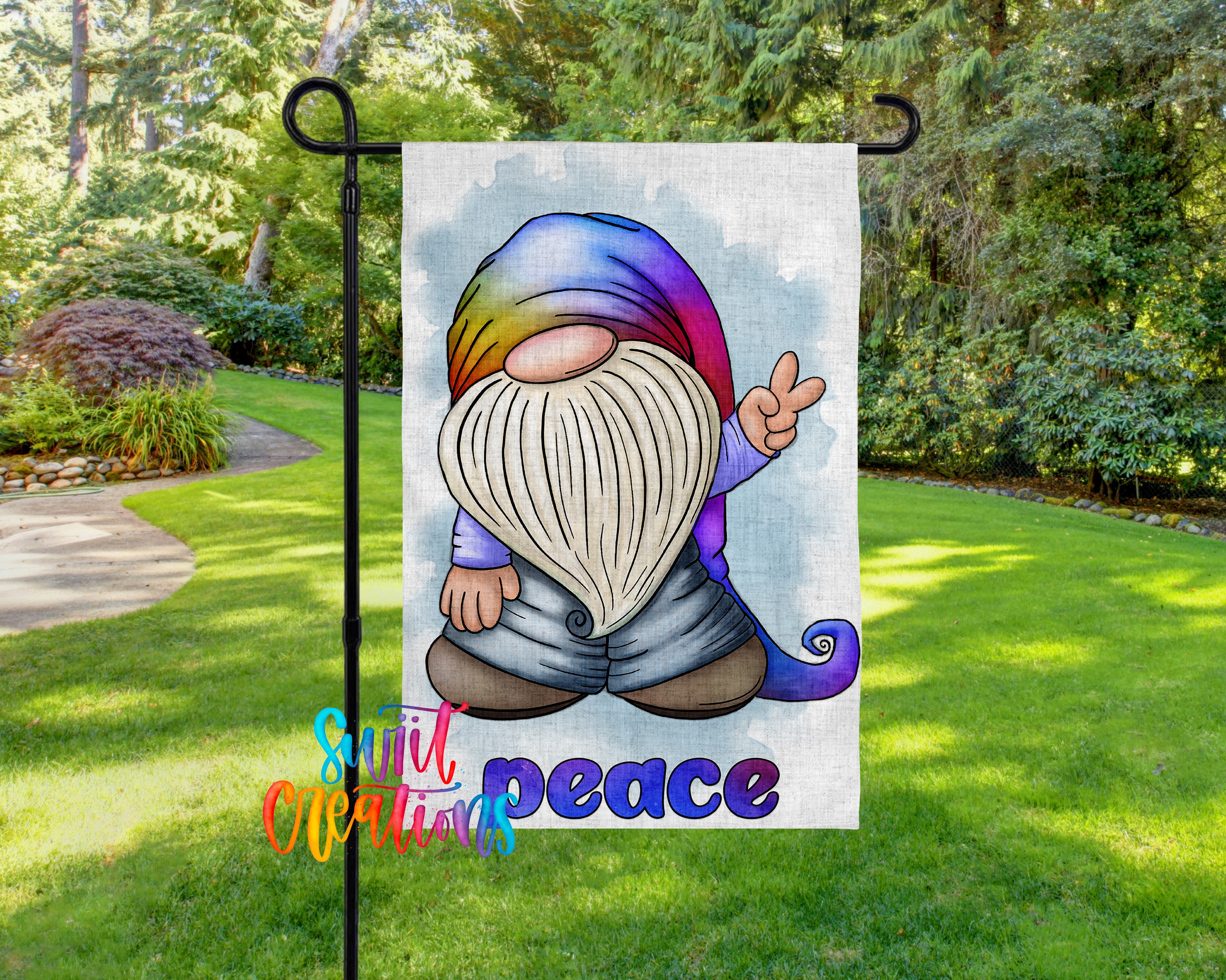 A colorful garden gnome sign with the word "Peace" written below it, set against a backdrop of lush greenery and a winding path.
