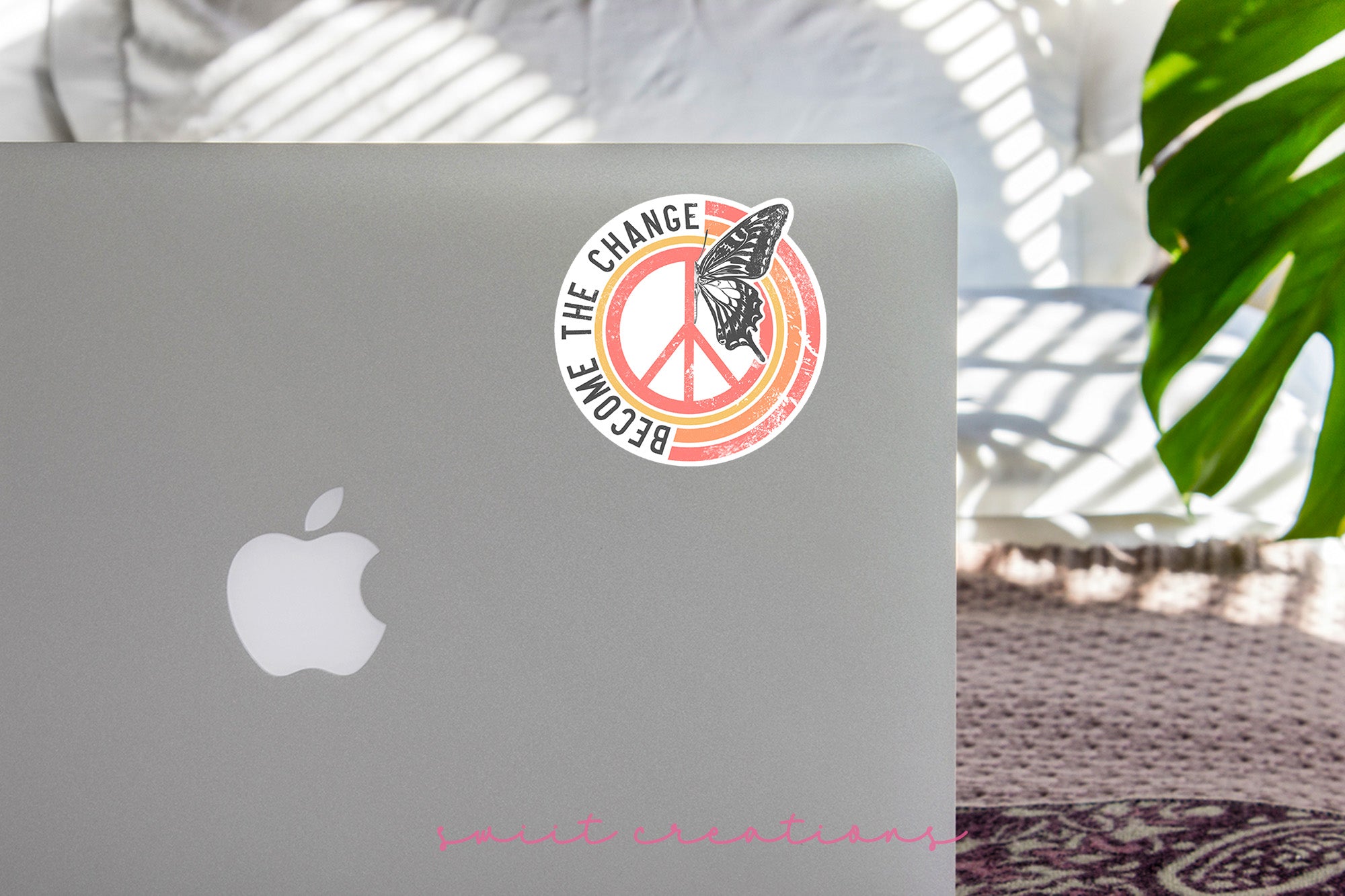 a laptop computer sitting on top of a table