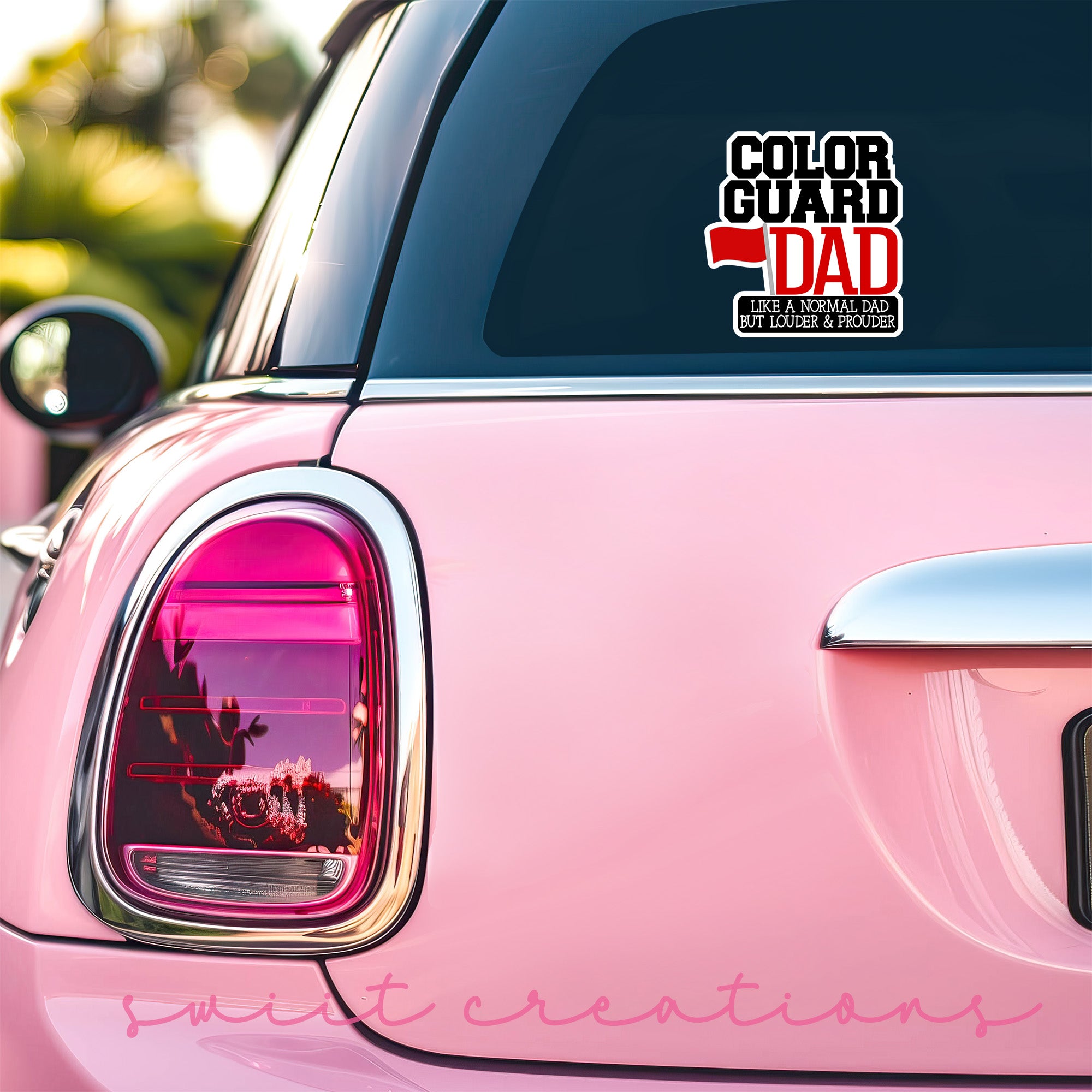 a pink car with a sticker that says color guard dad